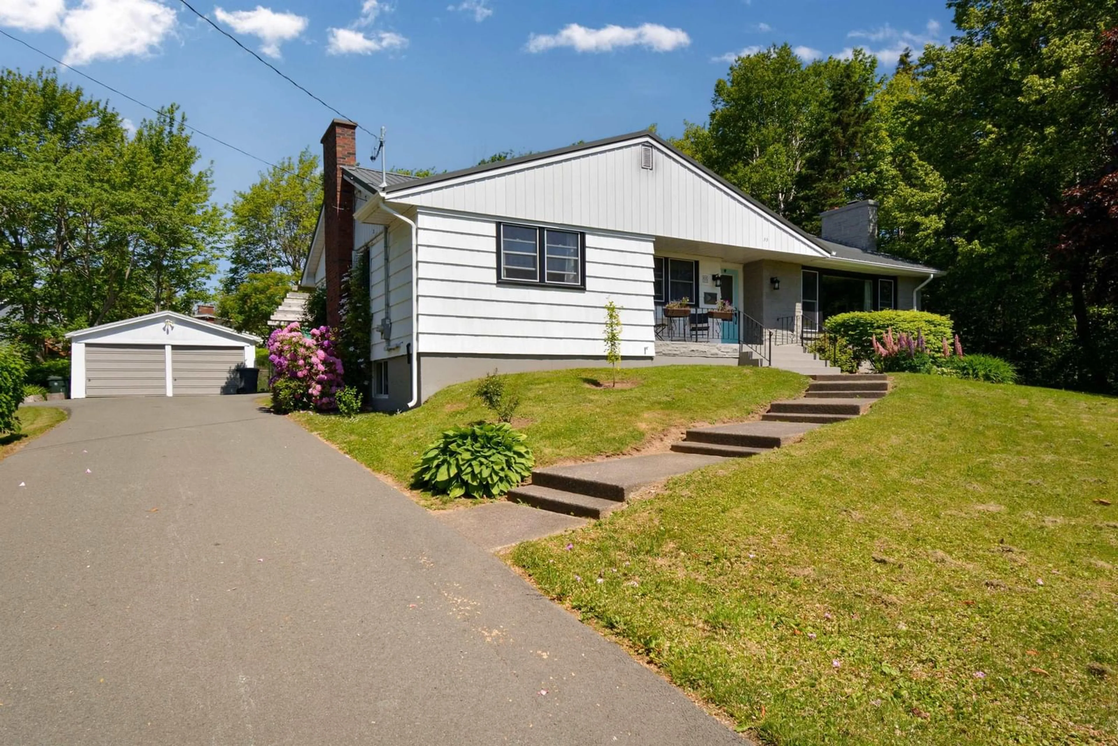 Home with vinyl exterior material, street for 55 Riverdale Dr, Sydney River Nova Scotia B1R 1P2
