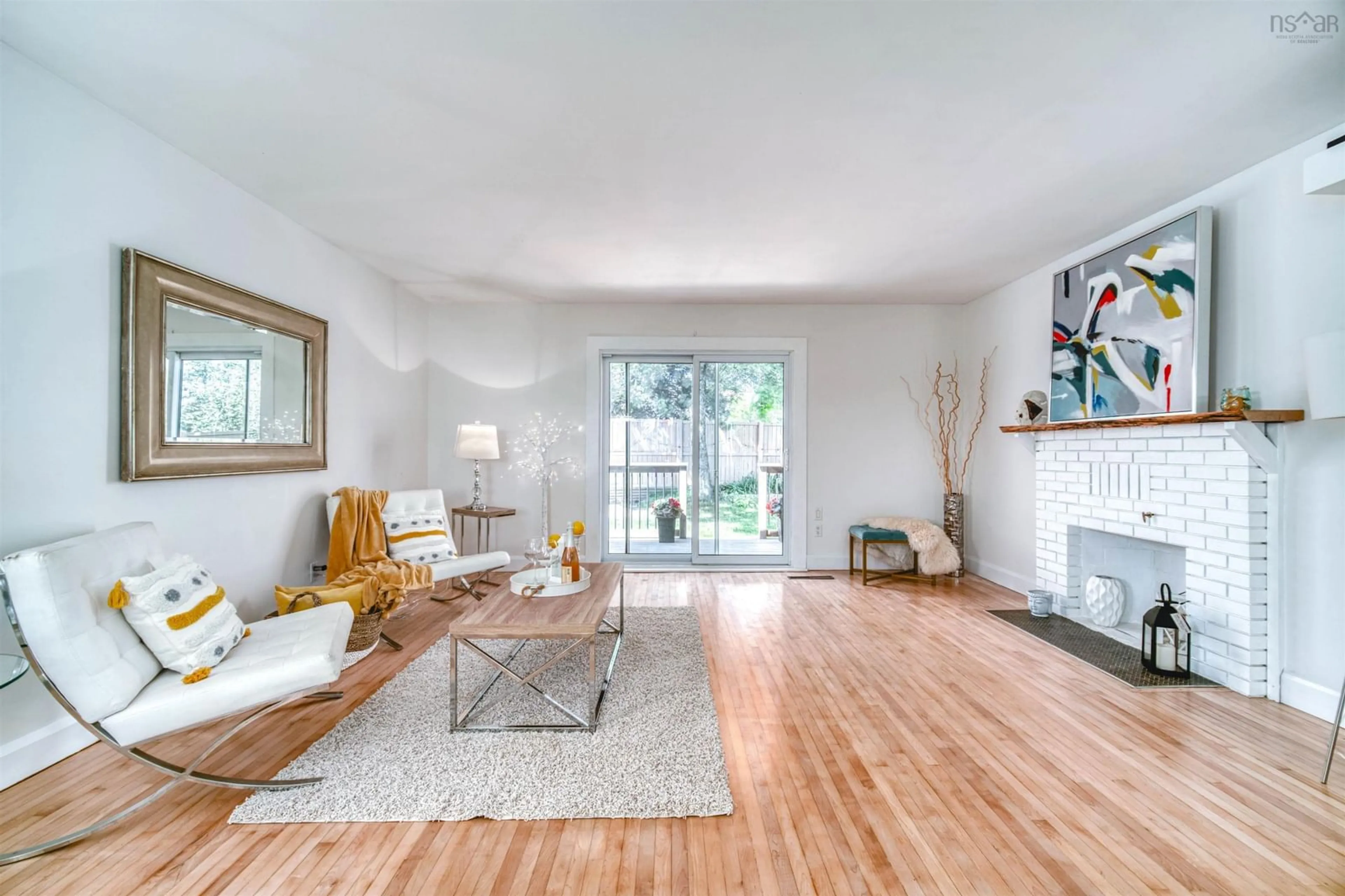 Living room with furniture, wood/laminate floor for 38 Harris Rd, Dartmouth Nova Scotia B2Y 3J4