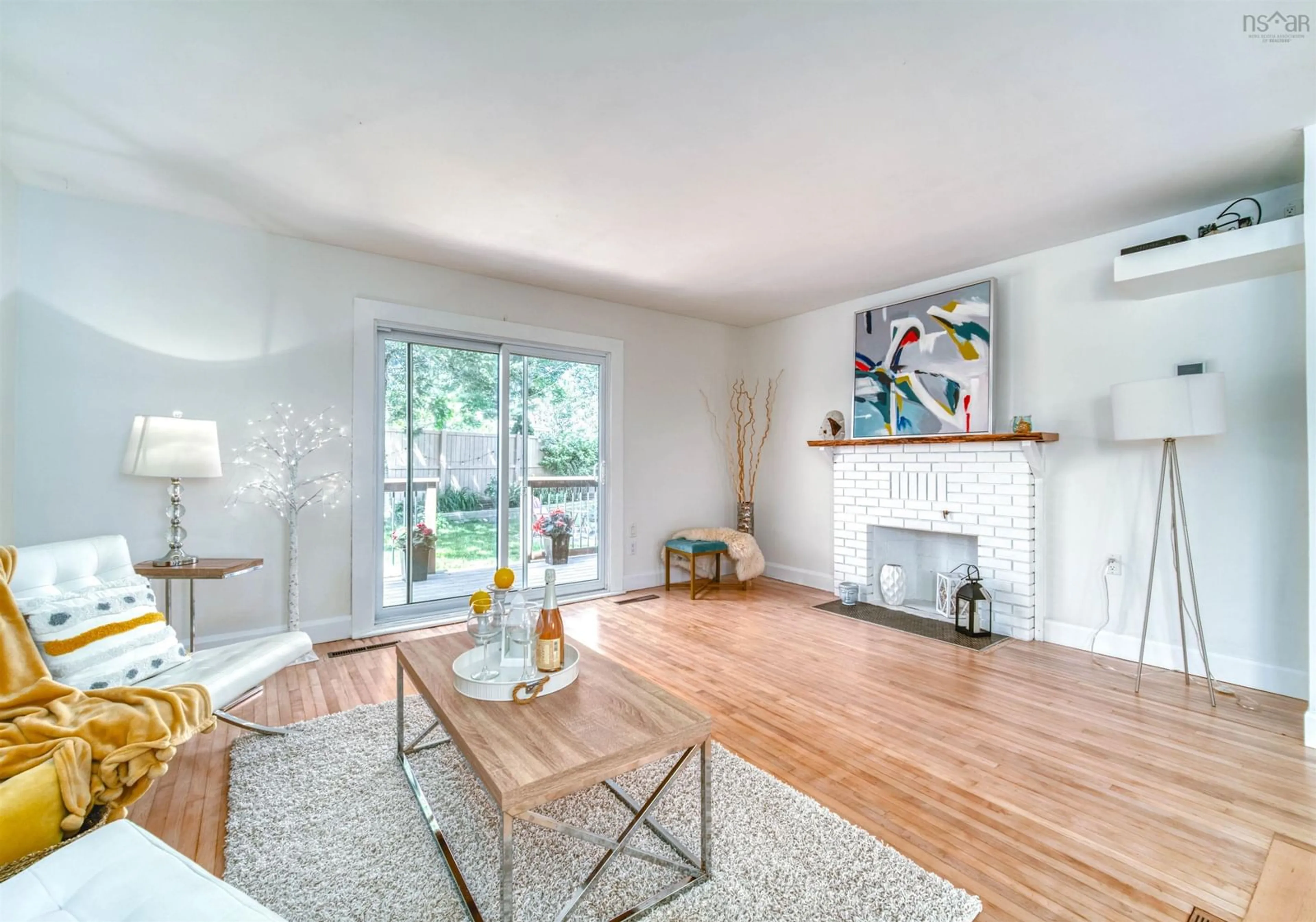 Living room with furniture, wood/laminate floor for 38 Harris Rd, Dartmouth Nova Scotia B2Y 3J4