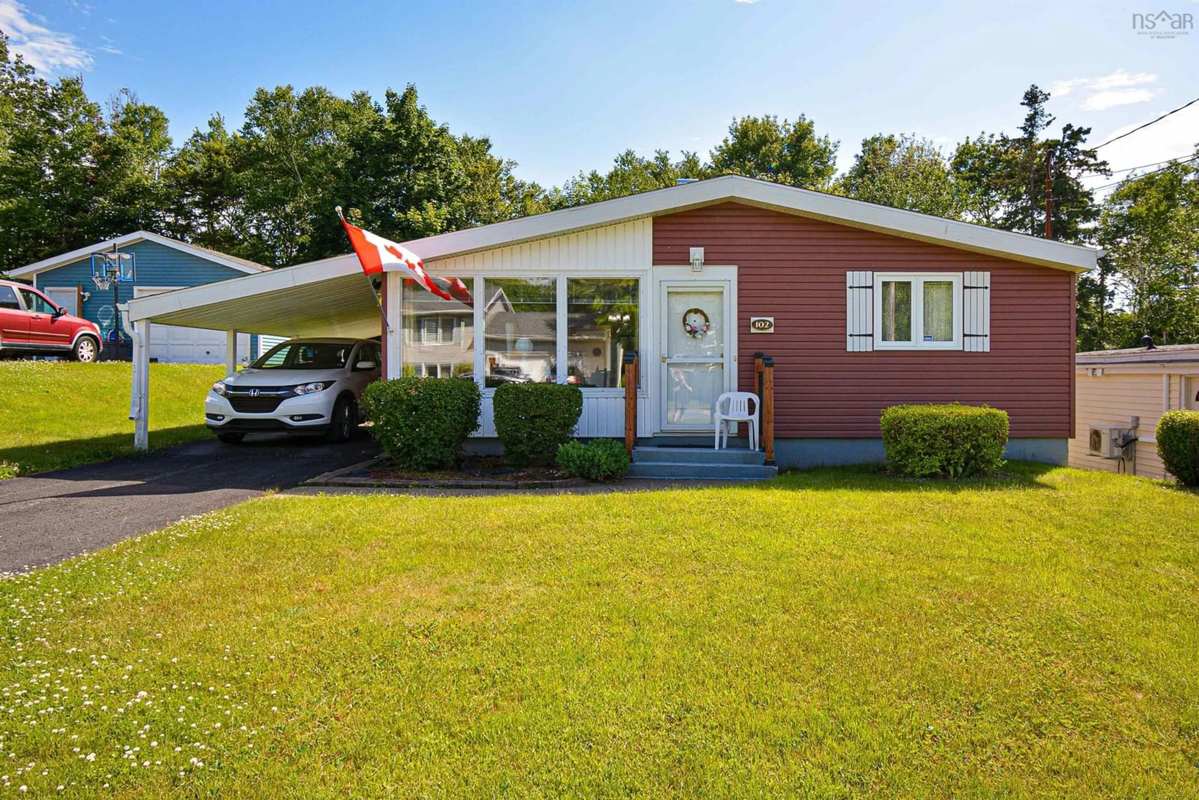 Home with vinyl exterior material, street for 102 Moxham Dr, Sydney Nova Scotia B1S 2A1