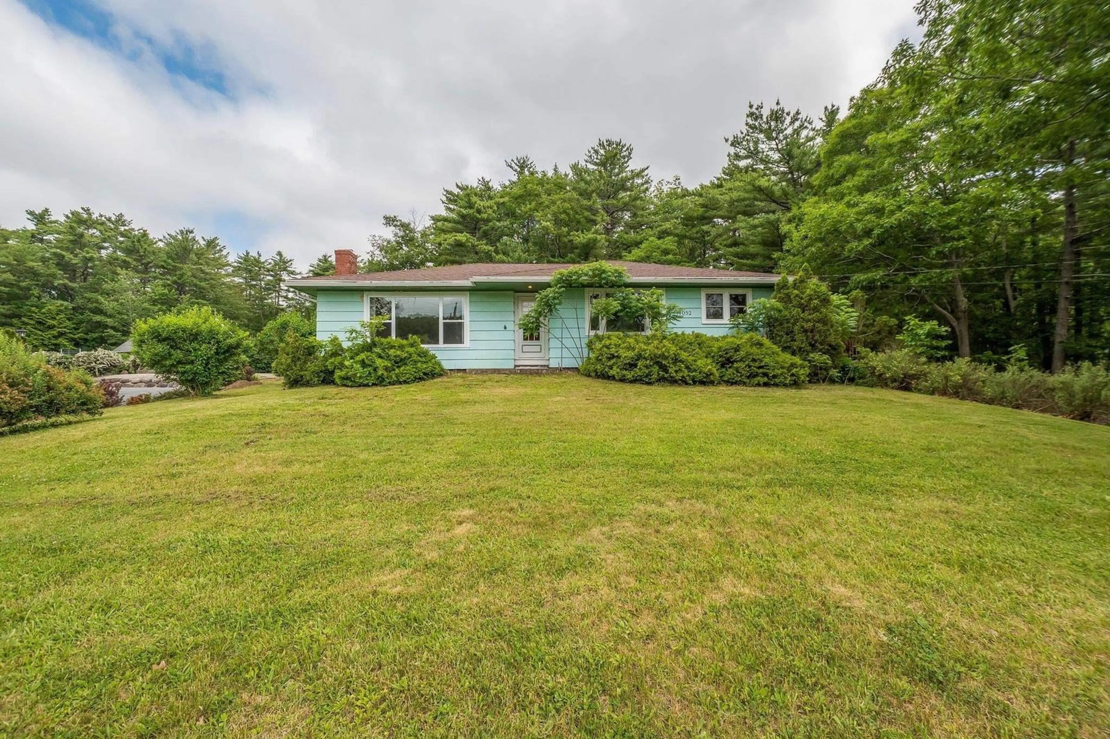 A pic from outside/outdoor area/front of a property/back of a property/a pic from drone, water/lake/river/ocean view for 14052 Highway 3, Dayspring Nova Scotia B4V 5P5