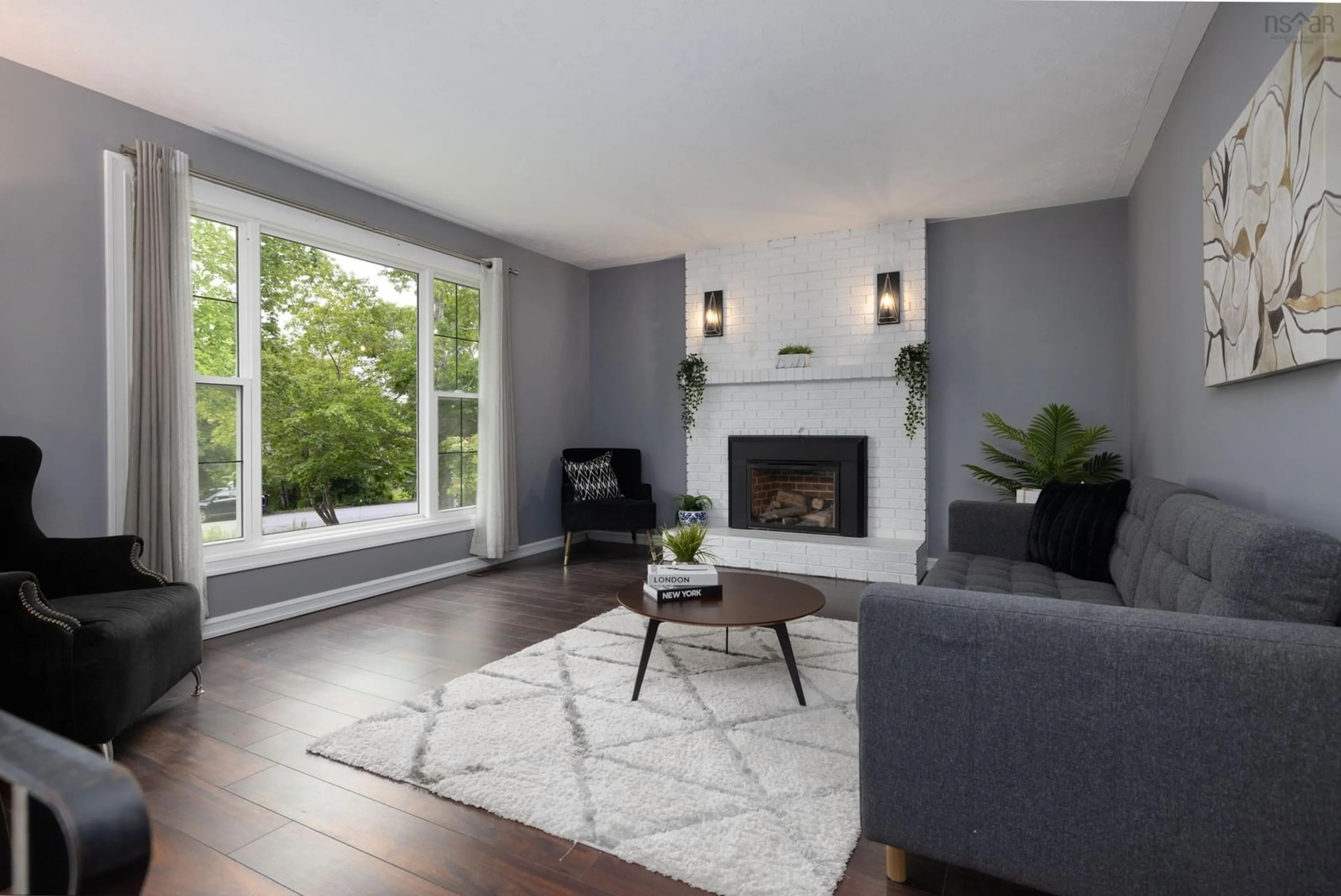 Living room with furniture, wood/laminate floor for 68 Karen Cres, Porters Lake Nova Scotia B3E 1K3