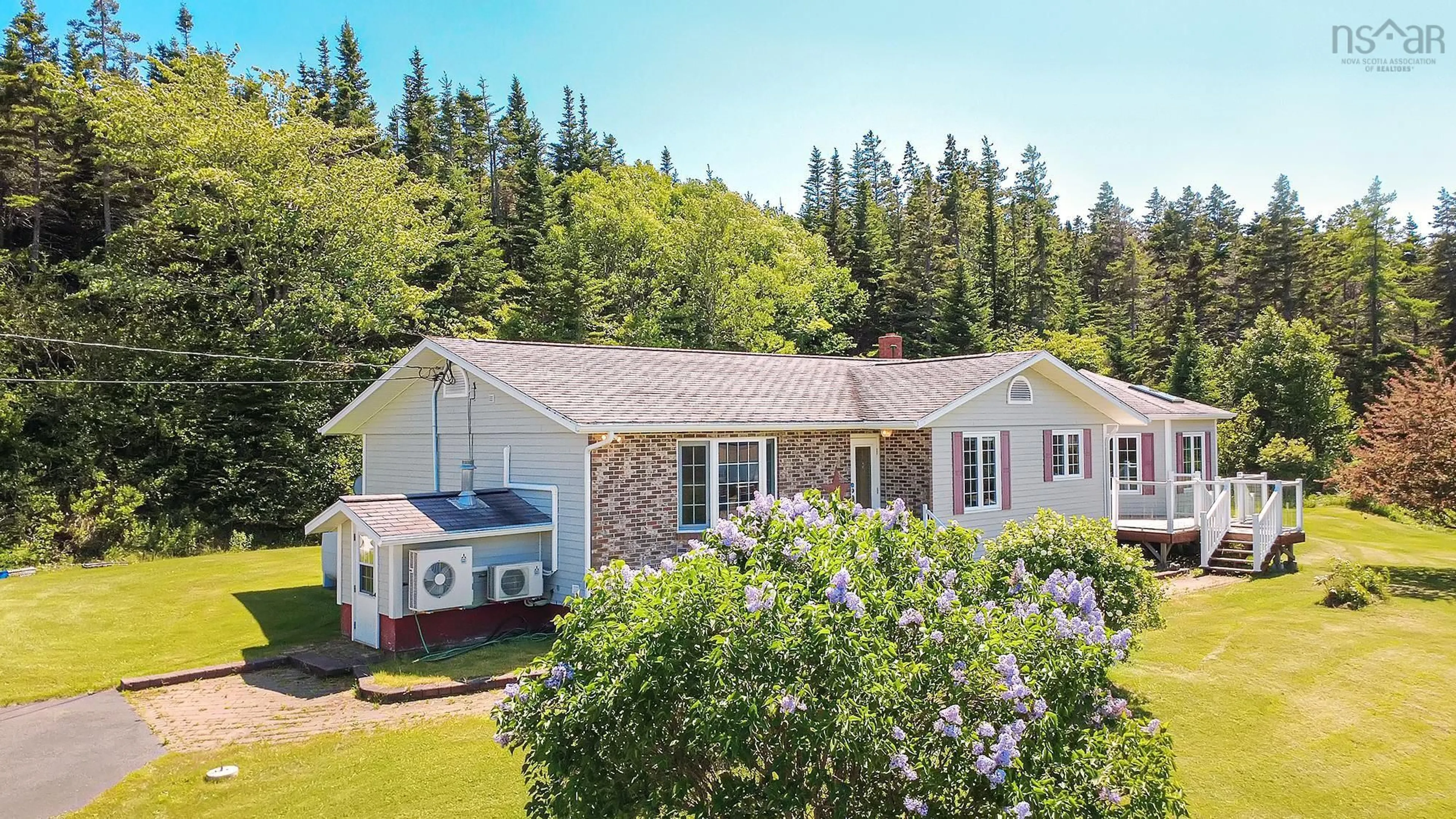 A pic from outside/outdoor area/front of a property/back of a property/a pic from drone, water/lake/river/ocean view for 1230 Veterans Memorial Hwy, Arichat Nova Scotia B0E 1A0