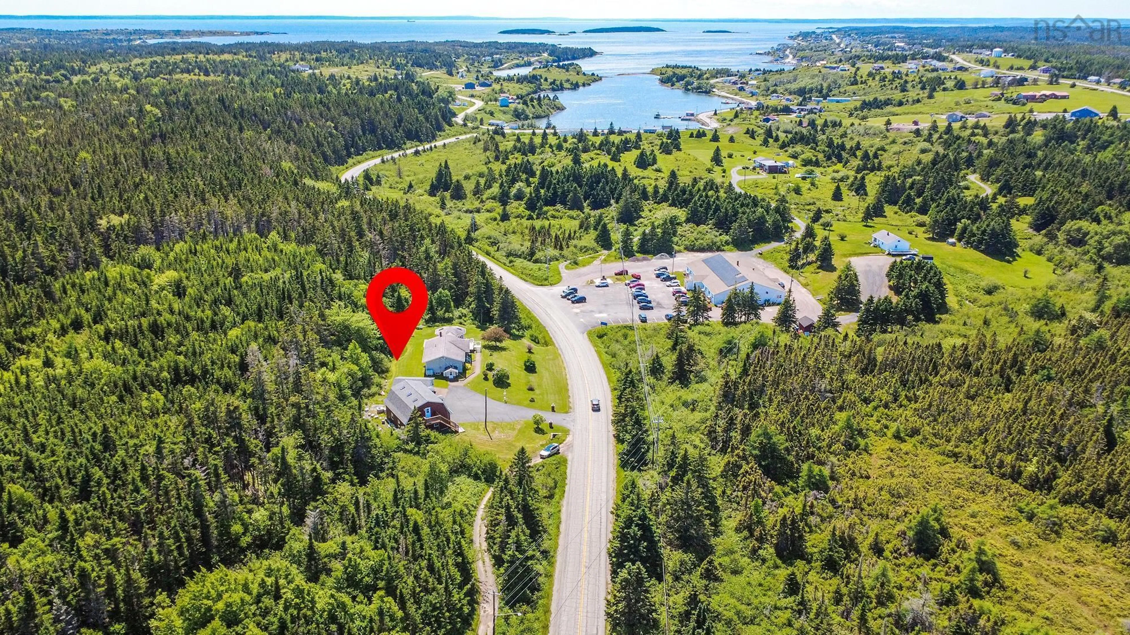 A pic from outside/outdoor area/front of a property/back of a property/a pic from drone, water/lake/river/ocean view for 1230 Veterans Memorial Hwy, Arichat Nova Scotia B0E 1A0