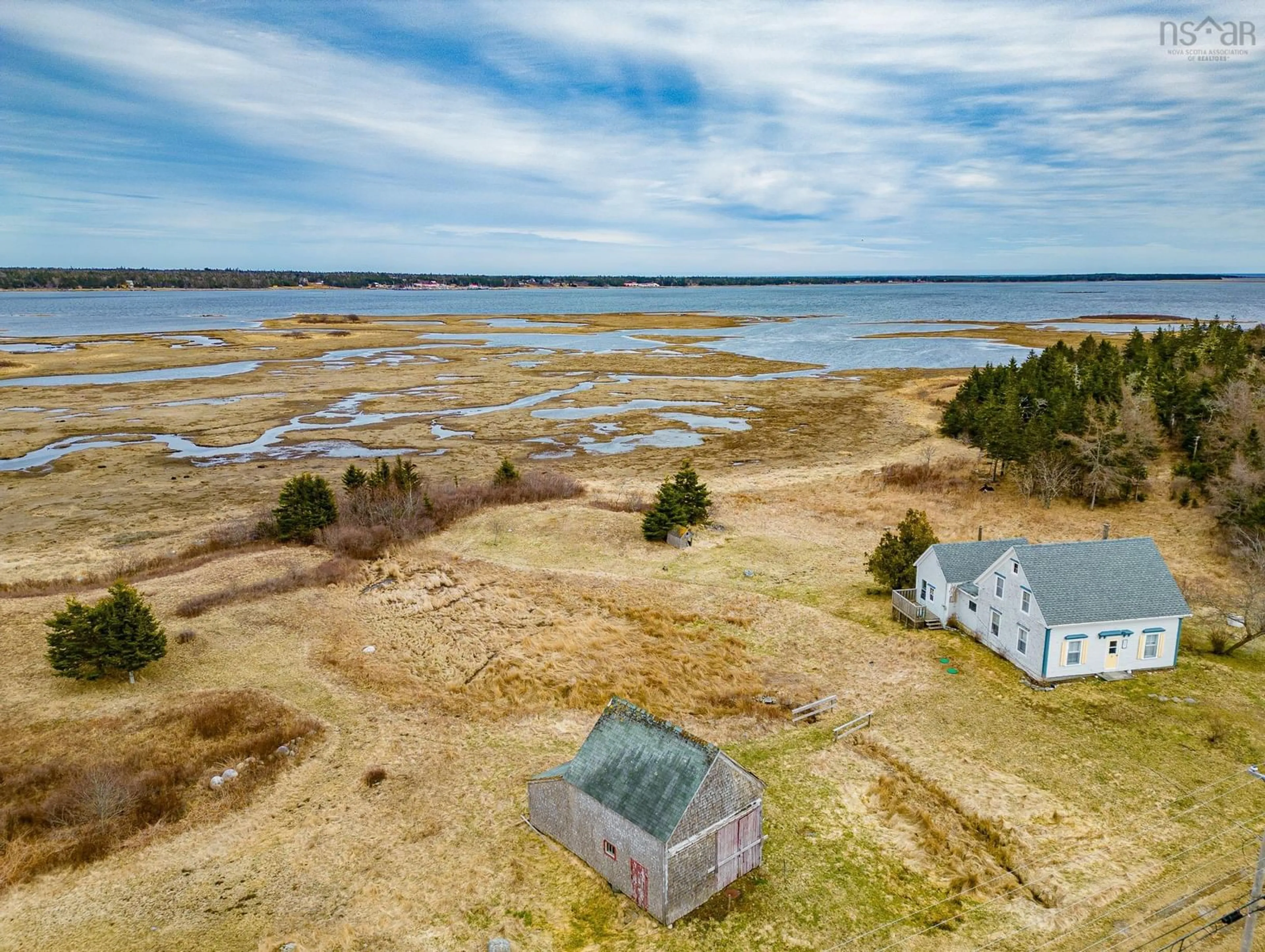 A pic from outside/outdoor area/front of a property/back of a property/a pic from drone, water/lake/river/ocean view for 4847 Shore Rd, North East Harbour Nova Scotia B0T 1W0