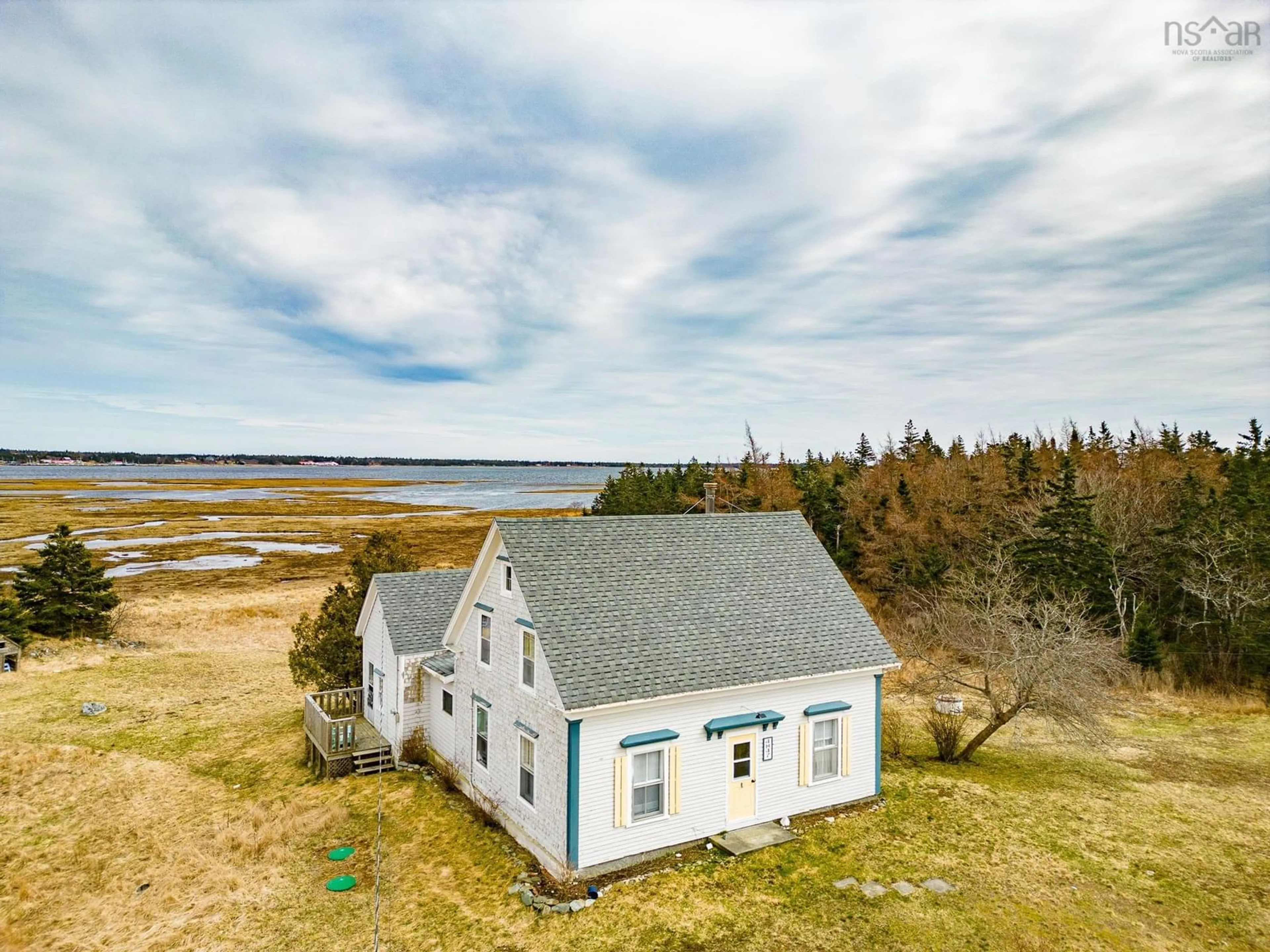 A pic from outside/outdoor area/front of a property/back of a property/a pic from drone, water/lake/river/ocean view for 4847 Shore Rd, North East Harbour Nova Scotia B0T 1W0
