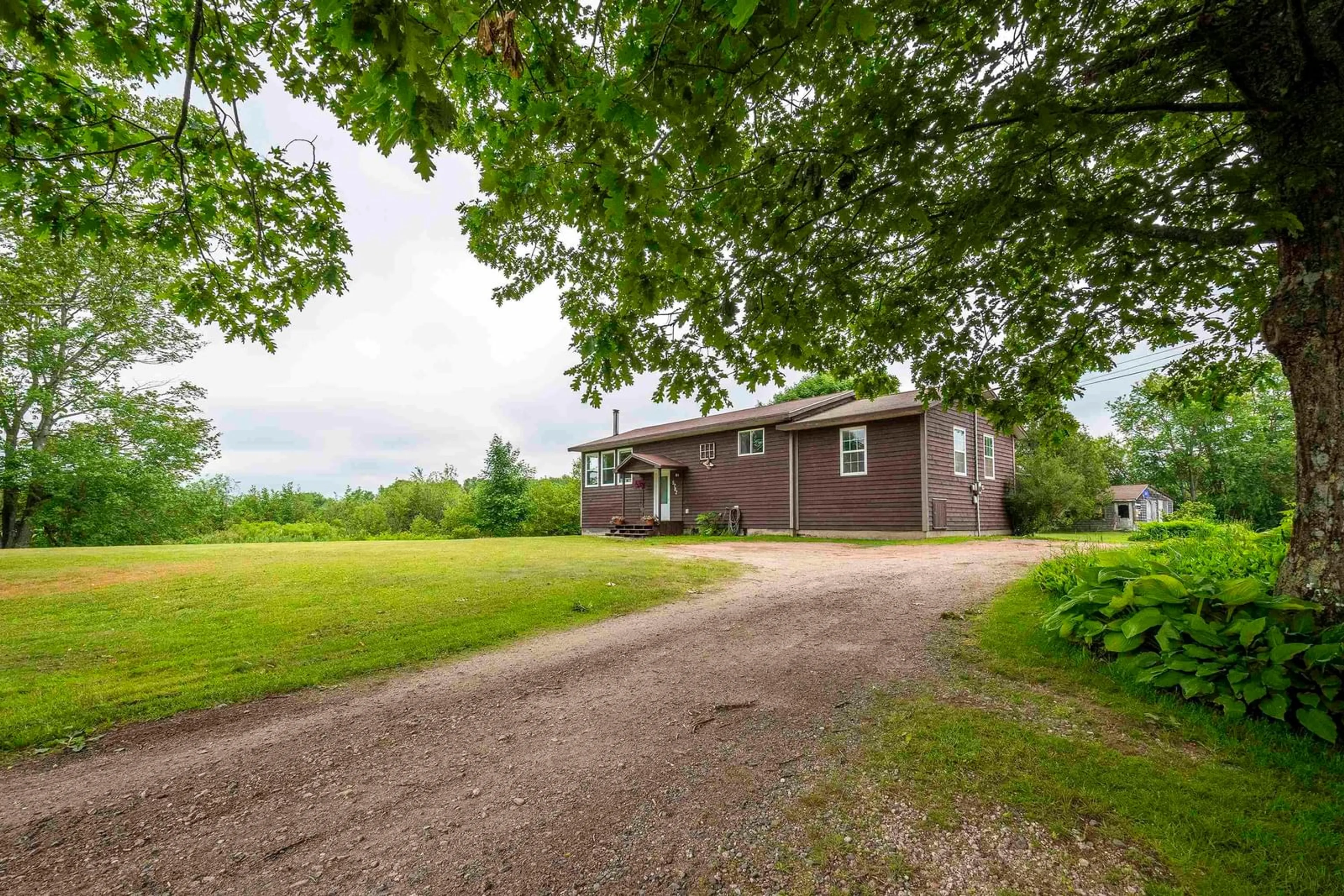 A pic from outside/outdoor area/front of a property/back of a property/a pic from drone, unknown for 5782 Highway 201 Hwy, Paradise Nova Scotia B0S 1C0
