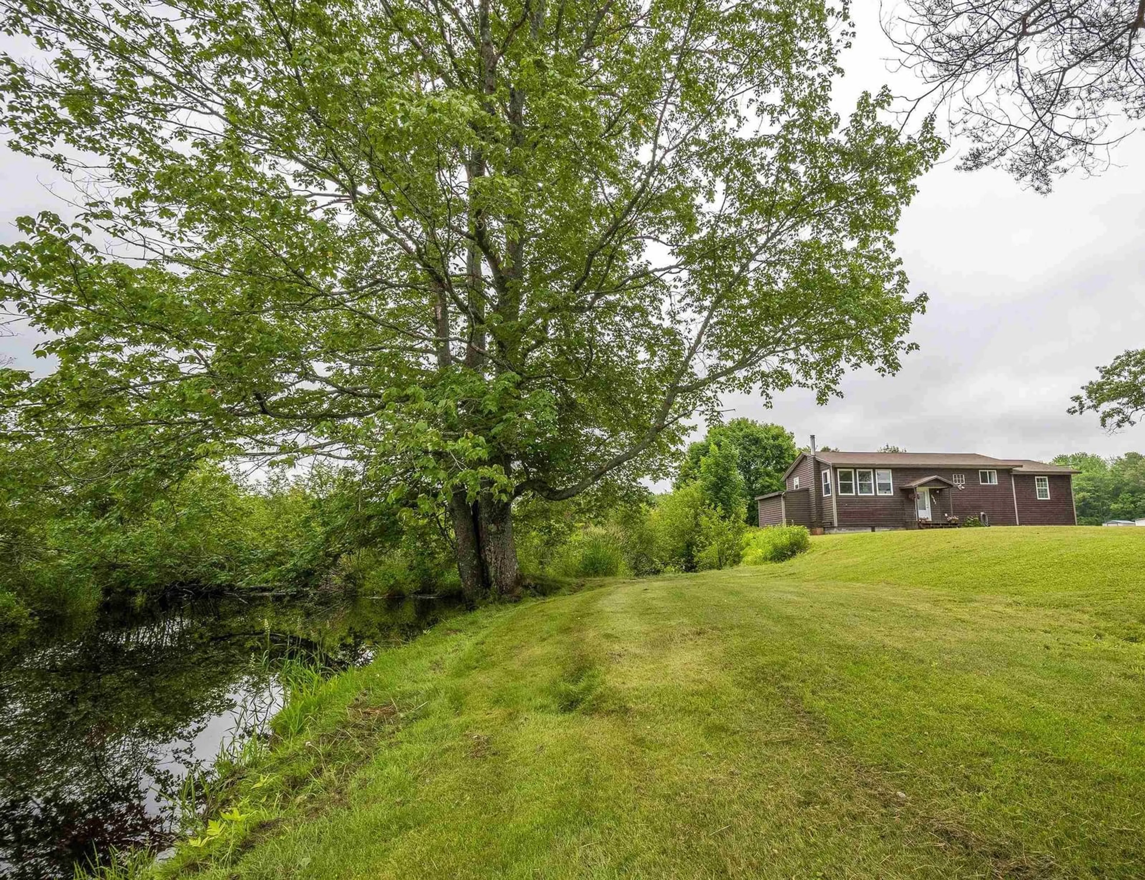 A pic from outside/outdoor area/front of a property/back of a property/a pic from drone, water/lake/river/ocean view for 5782 Highway 201 Hwy, Paradise Nova Scotia B0S 1C0