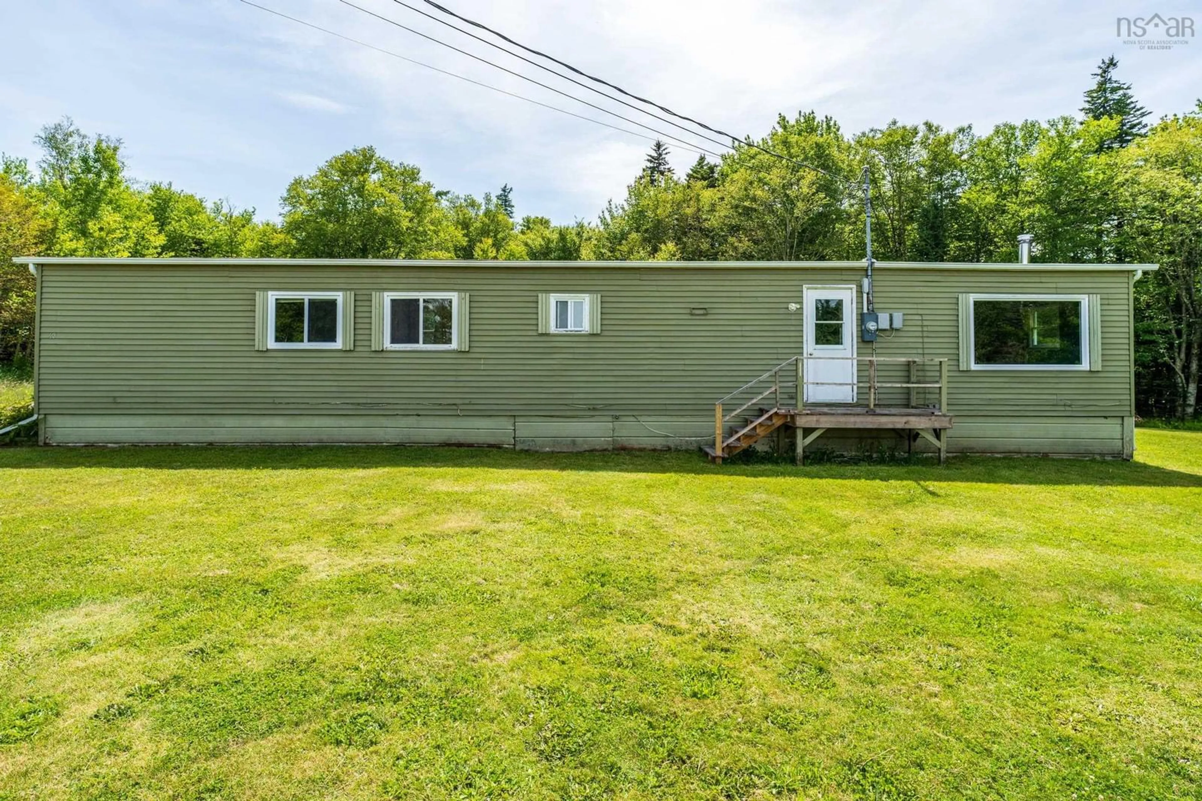 A pic from outside/outdoor area/front of a property/back of a property/a pic from drone, unknown for 40 Little River Road, Meteghan River Nova Scotia B2W 2L0