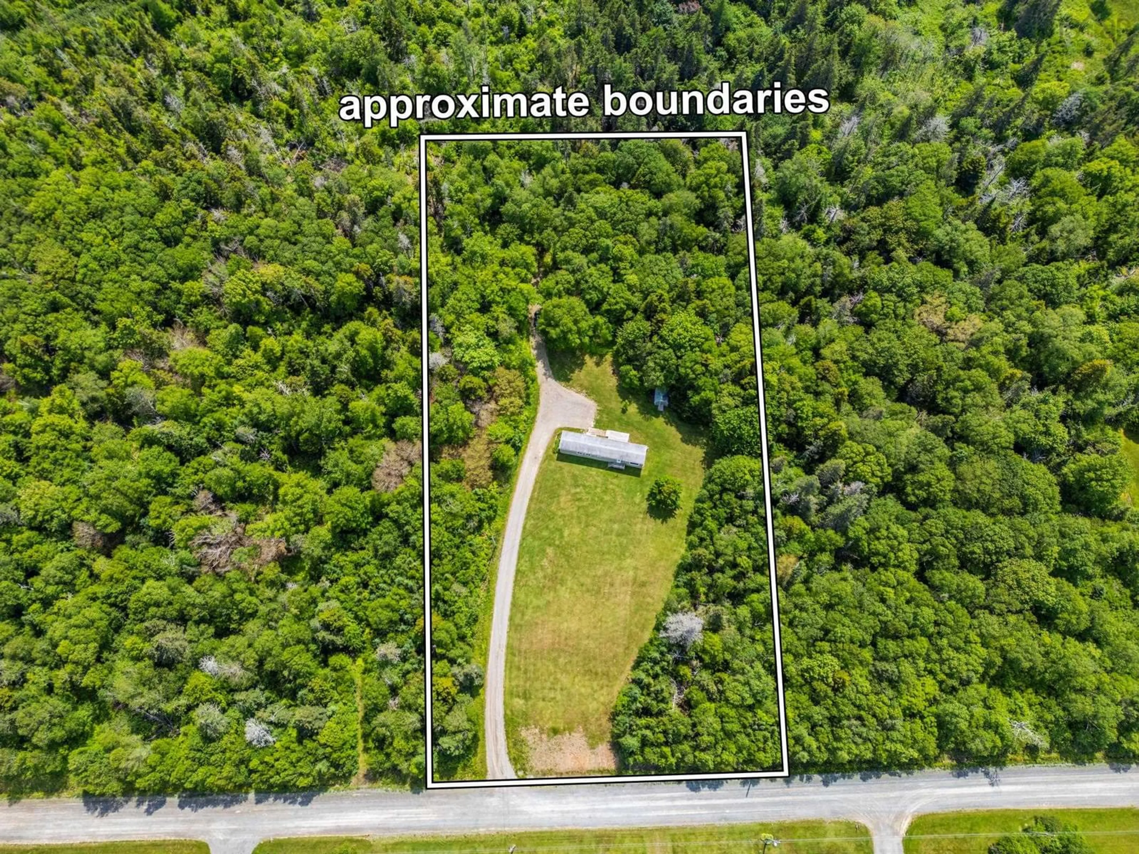 A pic from outside/outdoor area/front of a property/back of a property/a pic from drone, forest/trees view for 40 Little River Road, Meteghan River Nova Scotia B2W 2L0