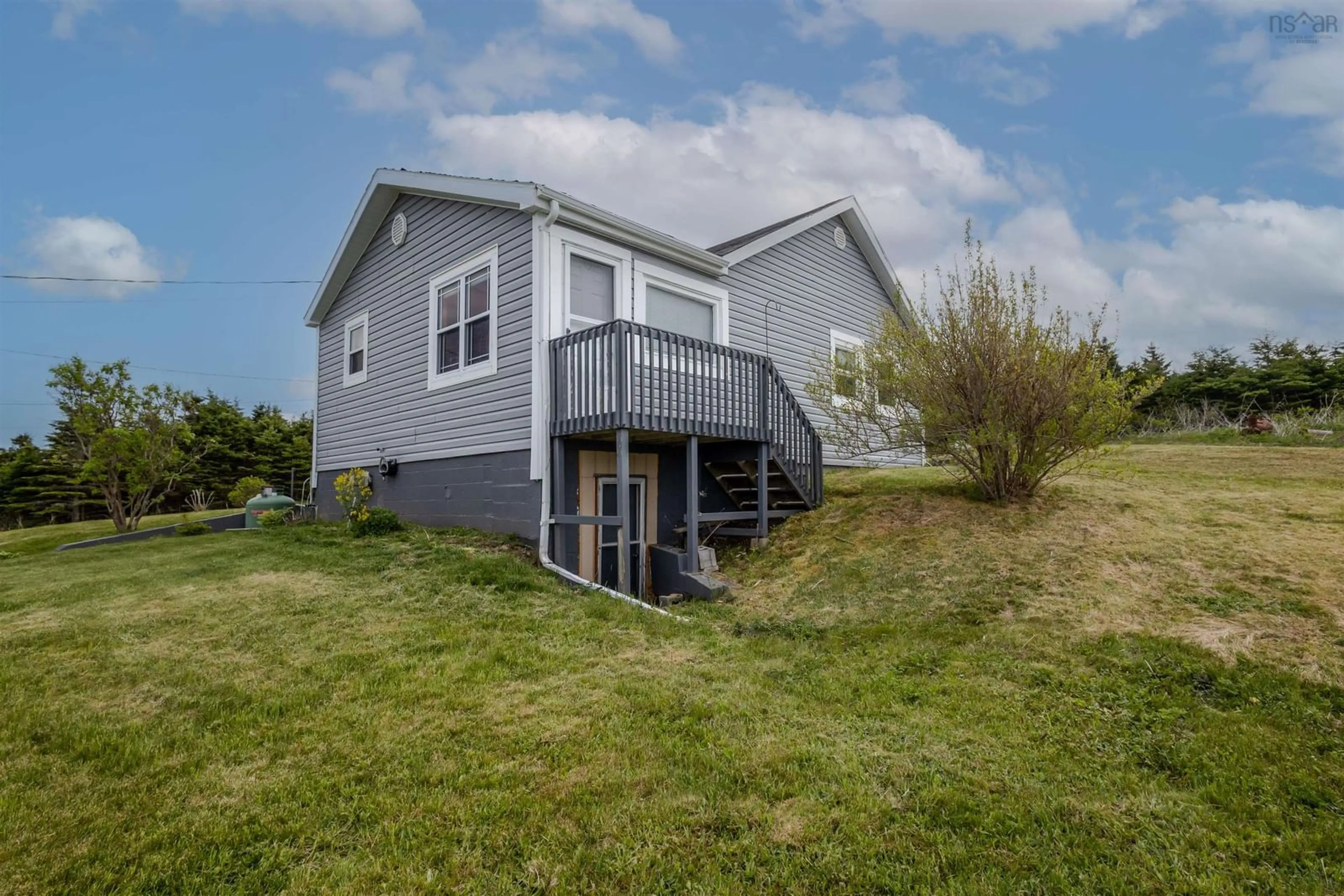 Home with vinyl exterior material, water/lake/river/ocean view for 10 Kenlock Dr, Main-À-Dieu Nova Scotia B1C 1Y4