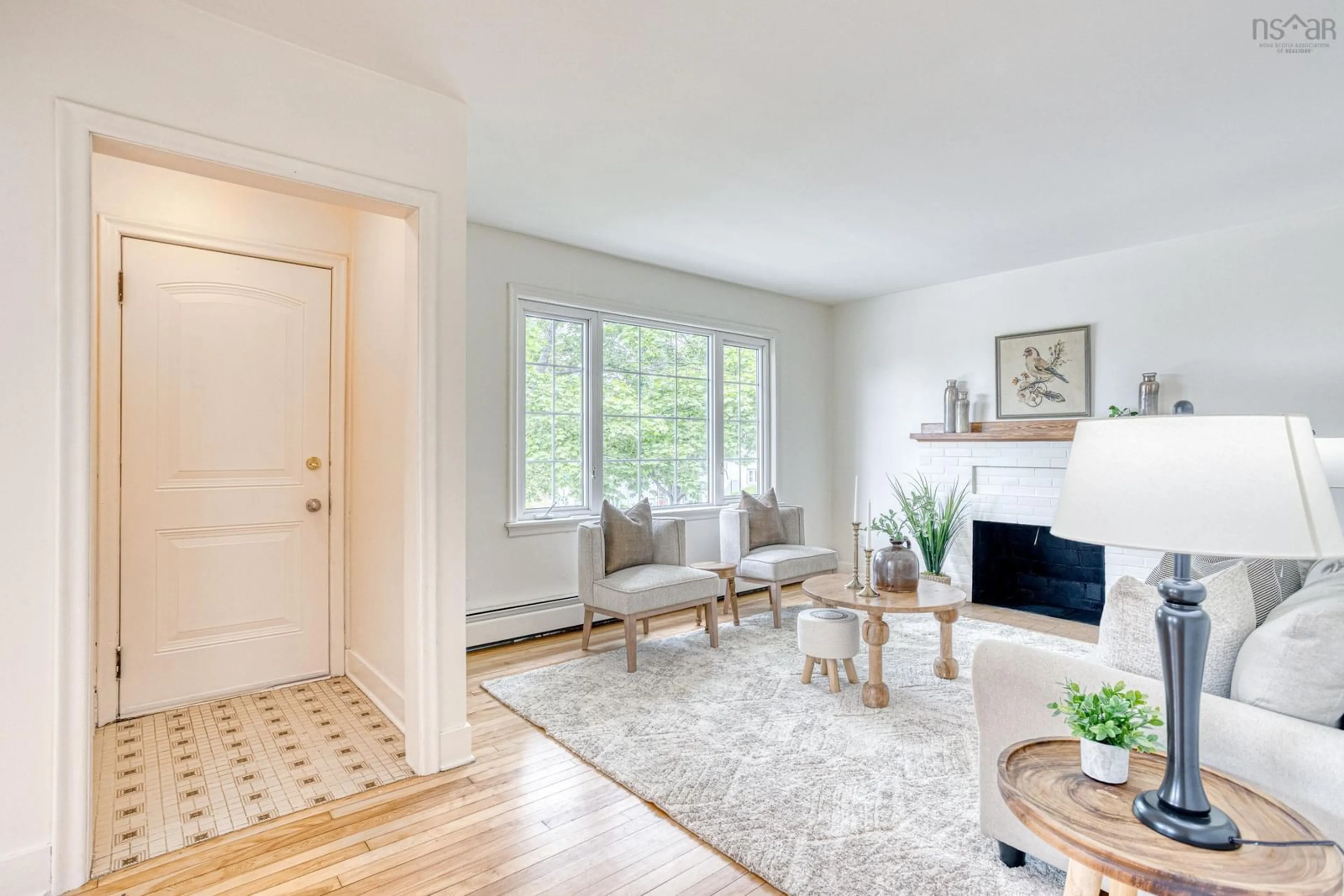 Living room with furniture, wood/laminate floor for 3443 - 3445 Stanbury St, Halifax Nova Scotia B3L 2X1