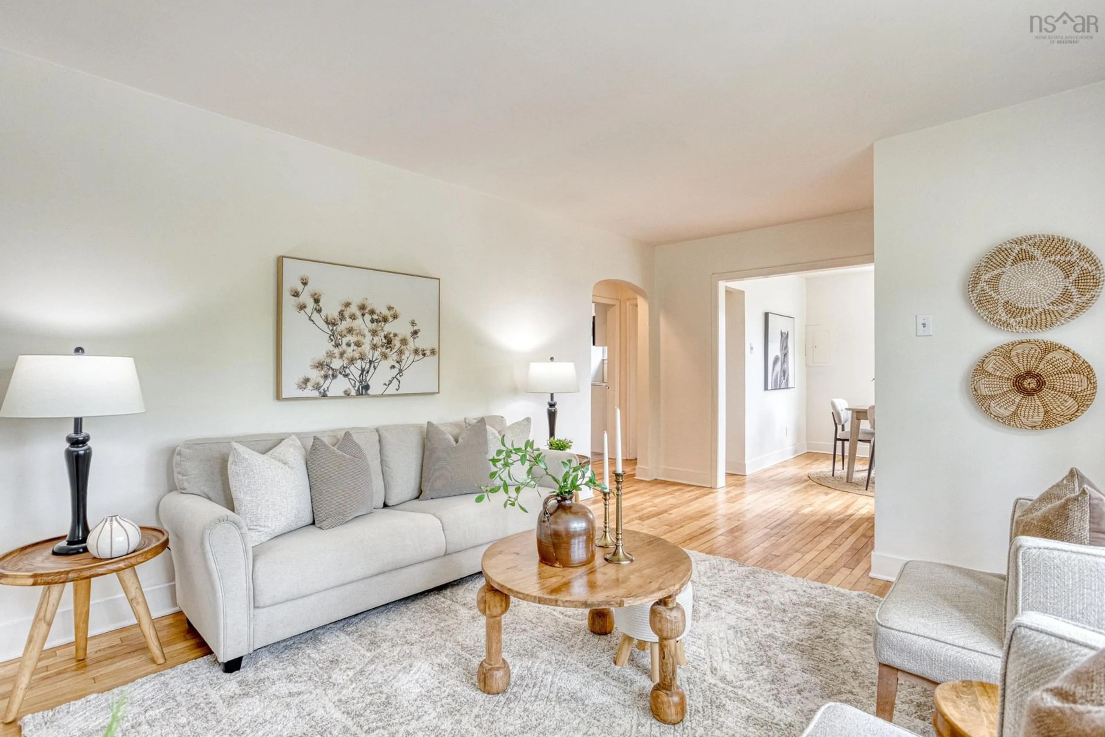 Living room with furniture, wood/laminate floor for 3443 - 3445 Stanbury St, Halifax Nova Scotia B3L 2X1