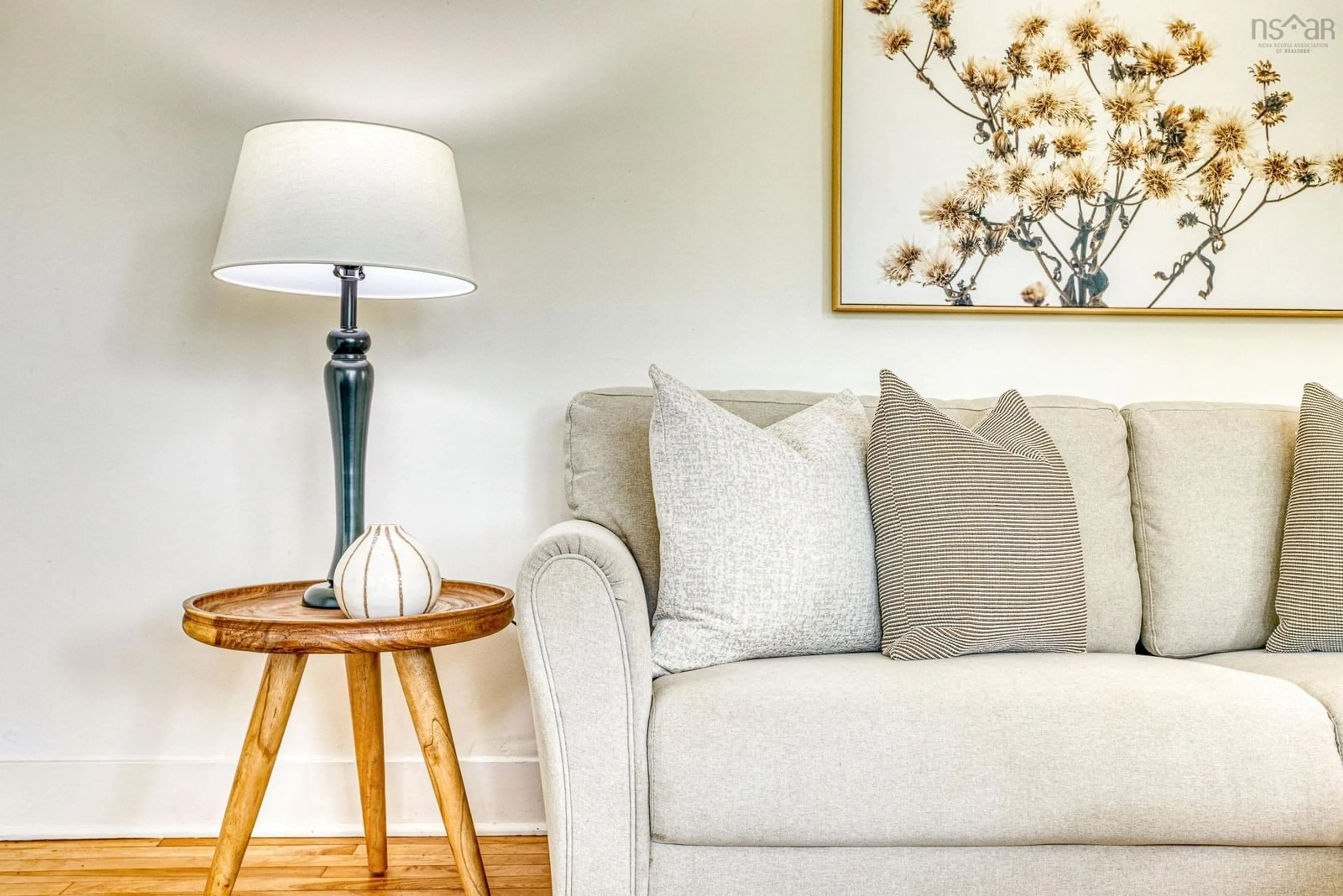 Living room with furniture, wood/laminate floor for 3443 - 3445 Stanbury St, Halifax Nova Scotia B3L 2X1