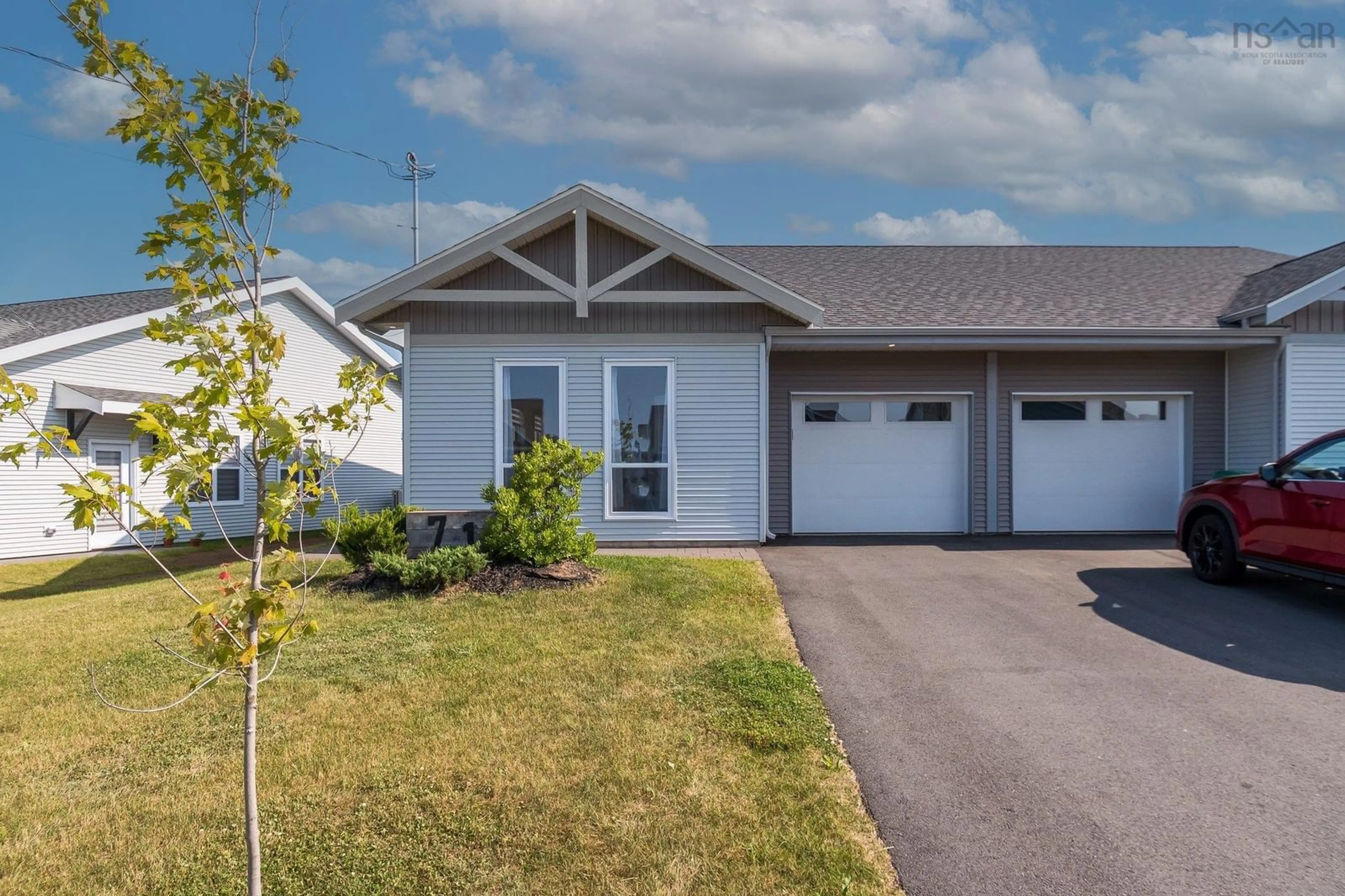 Home with vinyl exterior material, street for 71 Thistle St, Falmouth Nova Scotia B0P 1L0