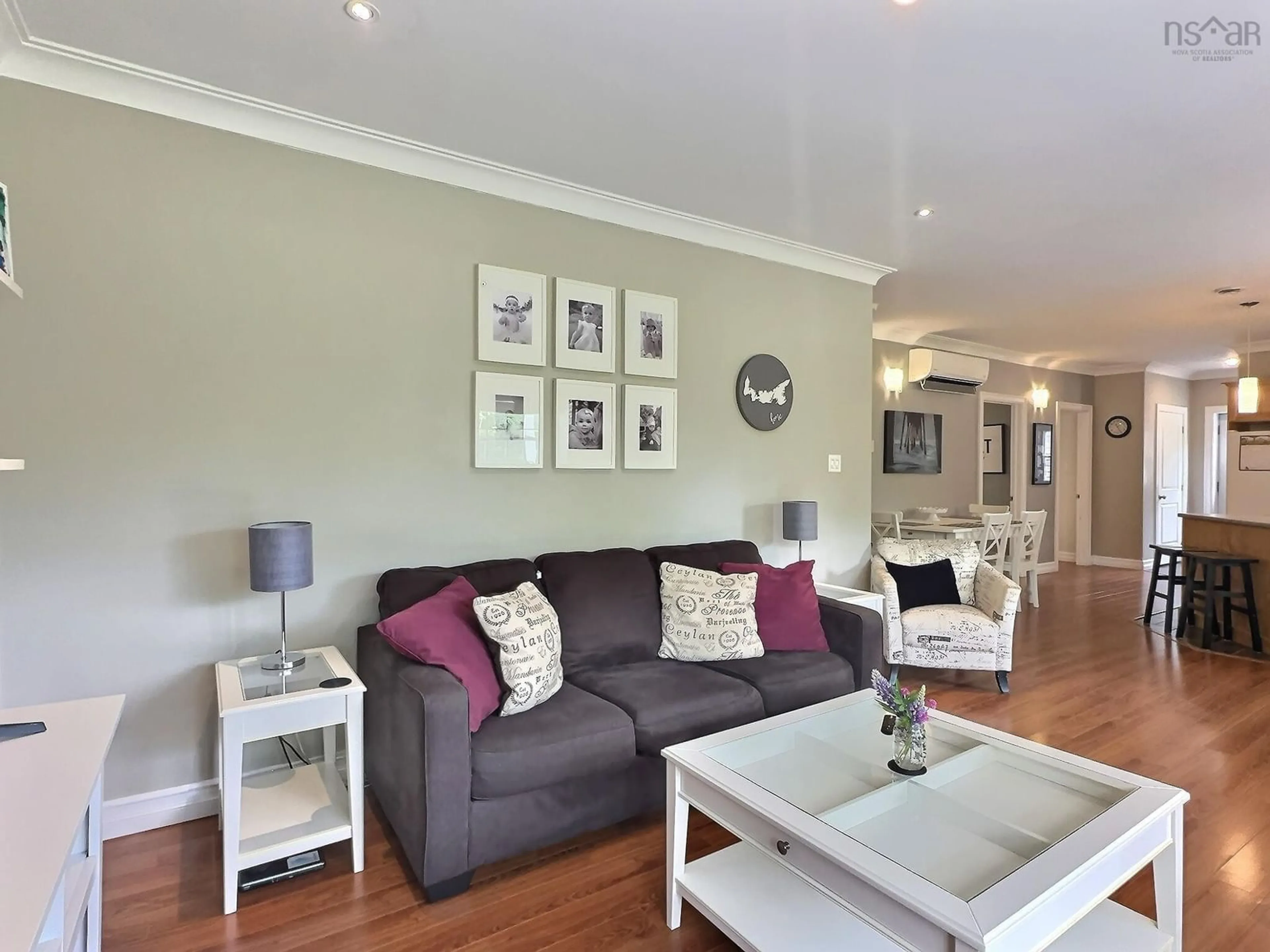 Living room with furniture, wood/laminate floor for 70 Forest Glen Rd, Brookfield Nova Scotia B0N 1C0