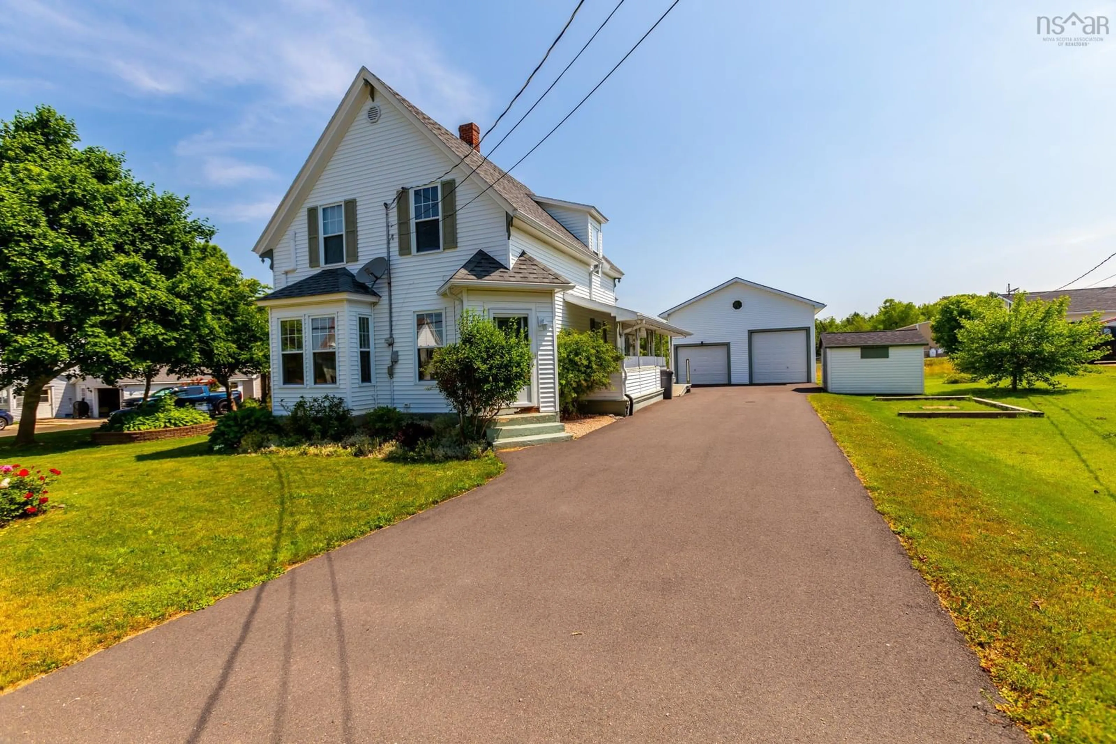 A pic from outside/outdoor area/front of a property/back of a property/a pic from drone, street for 102 Lawrencetown Lane, Lawrencetown Nova Scotia B0S 1M0