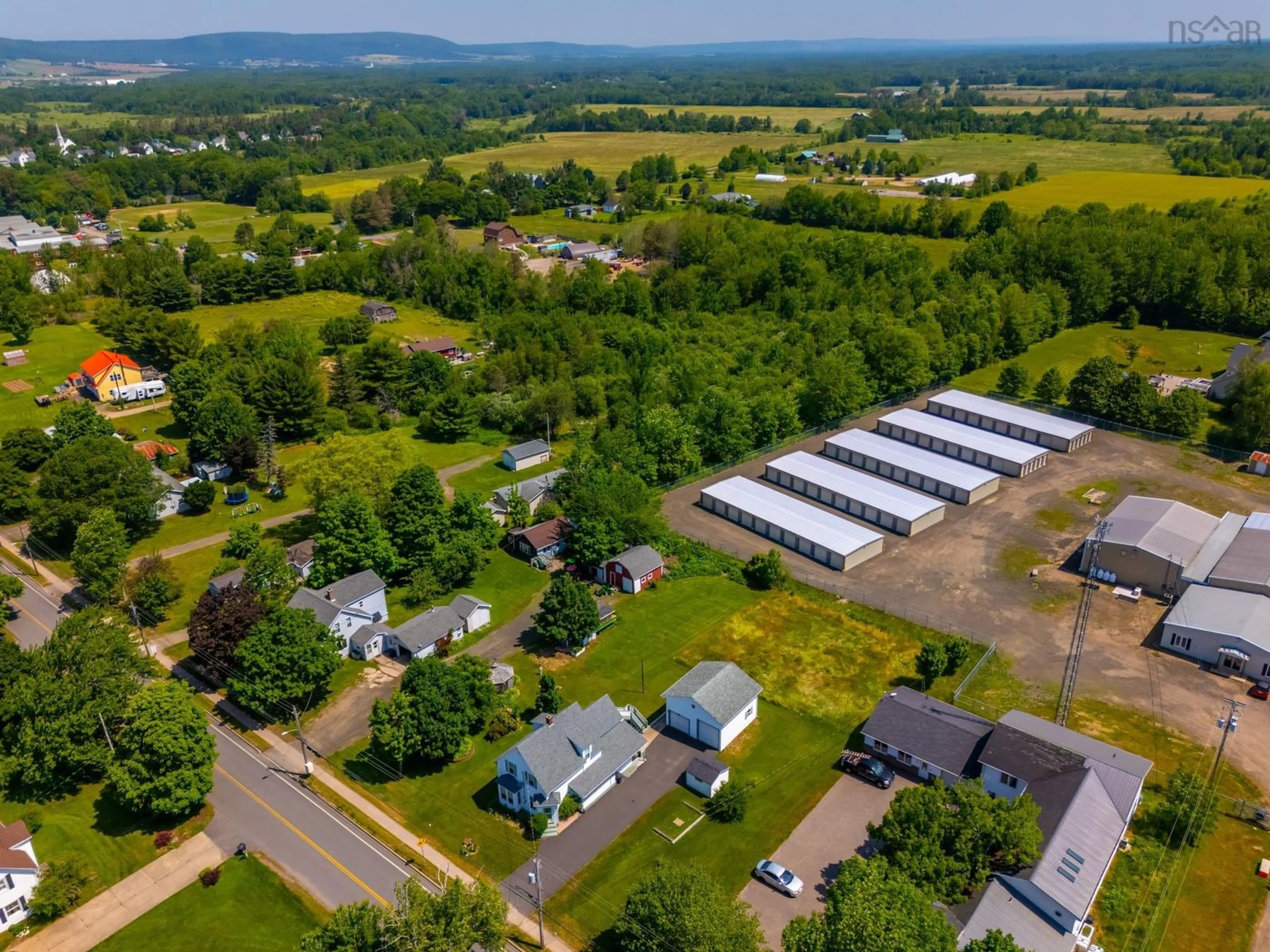 A pic from outside/outdoor area/front of a property/back of a property/a pic from drone, unknown for 102 Lawrencetown Lane, Lawrencetown Nova Scotia B0S 1M0