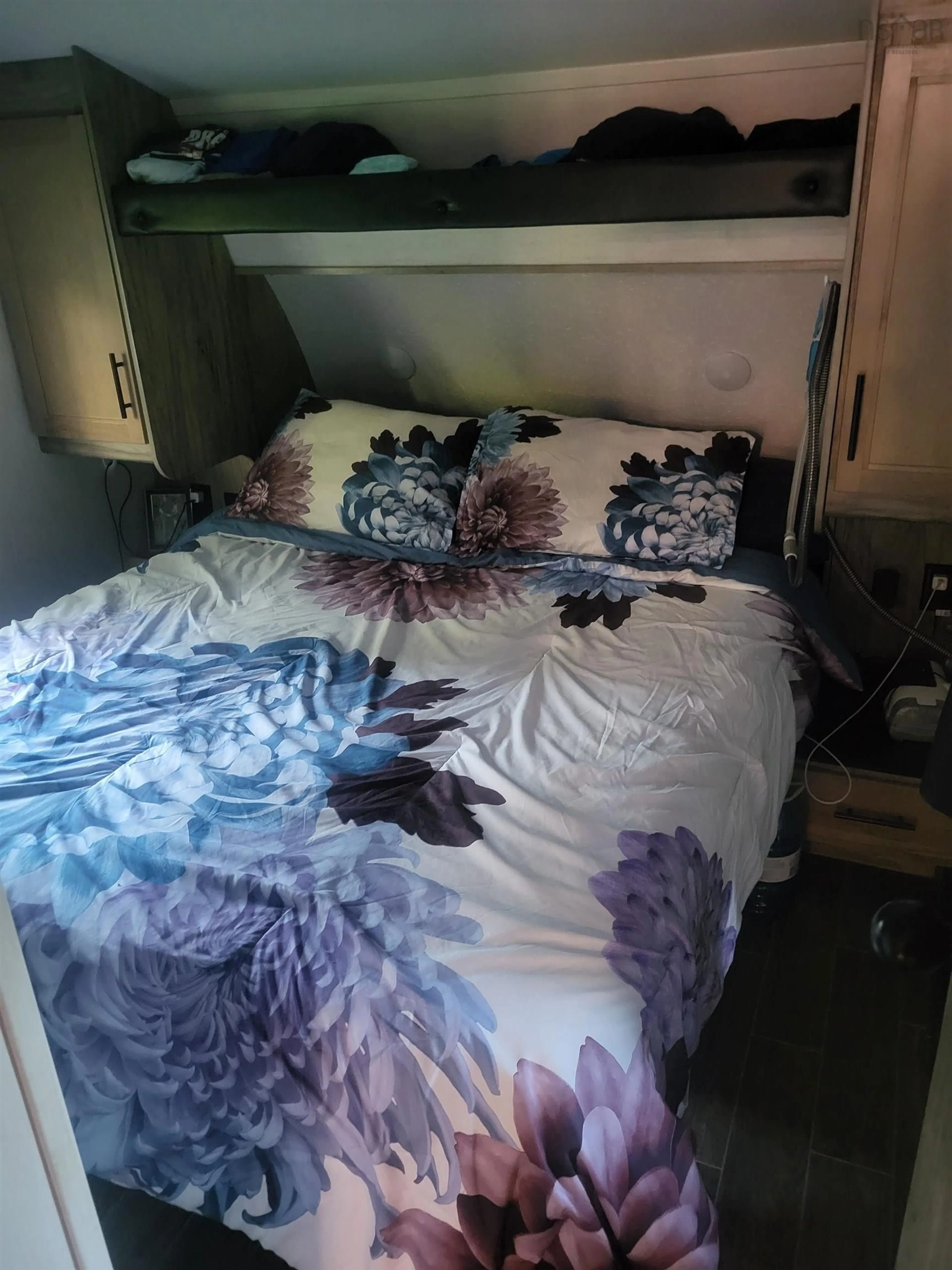 Bedroom with bed, floor is not visible for 6999 Highway 2, Portapique Nova Scotia B0M 1B0