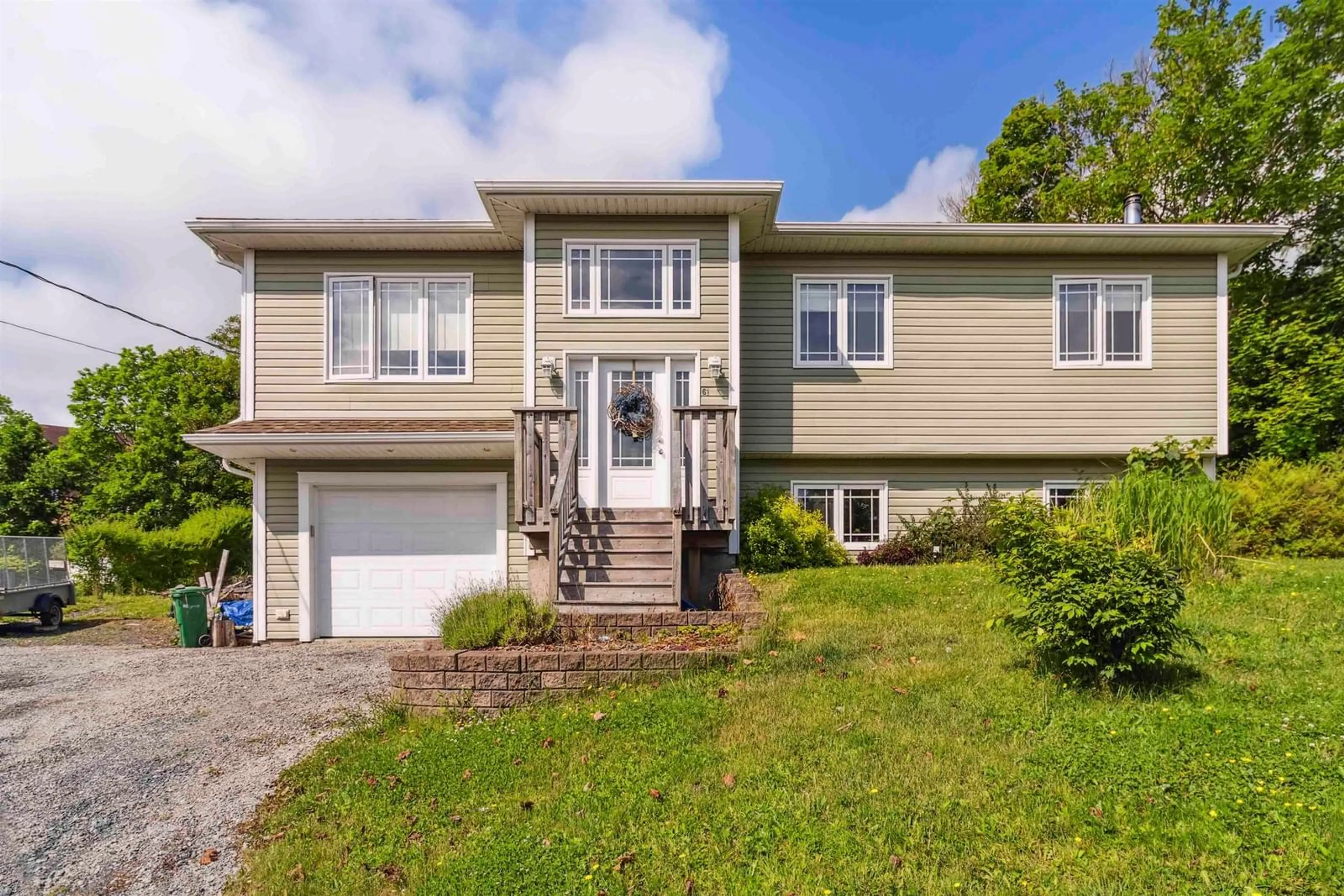 Home with vinyl exterior material, street for 61 Maple Ave, Lunenburg Nova Scotia B0J 2C0