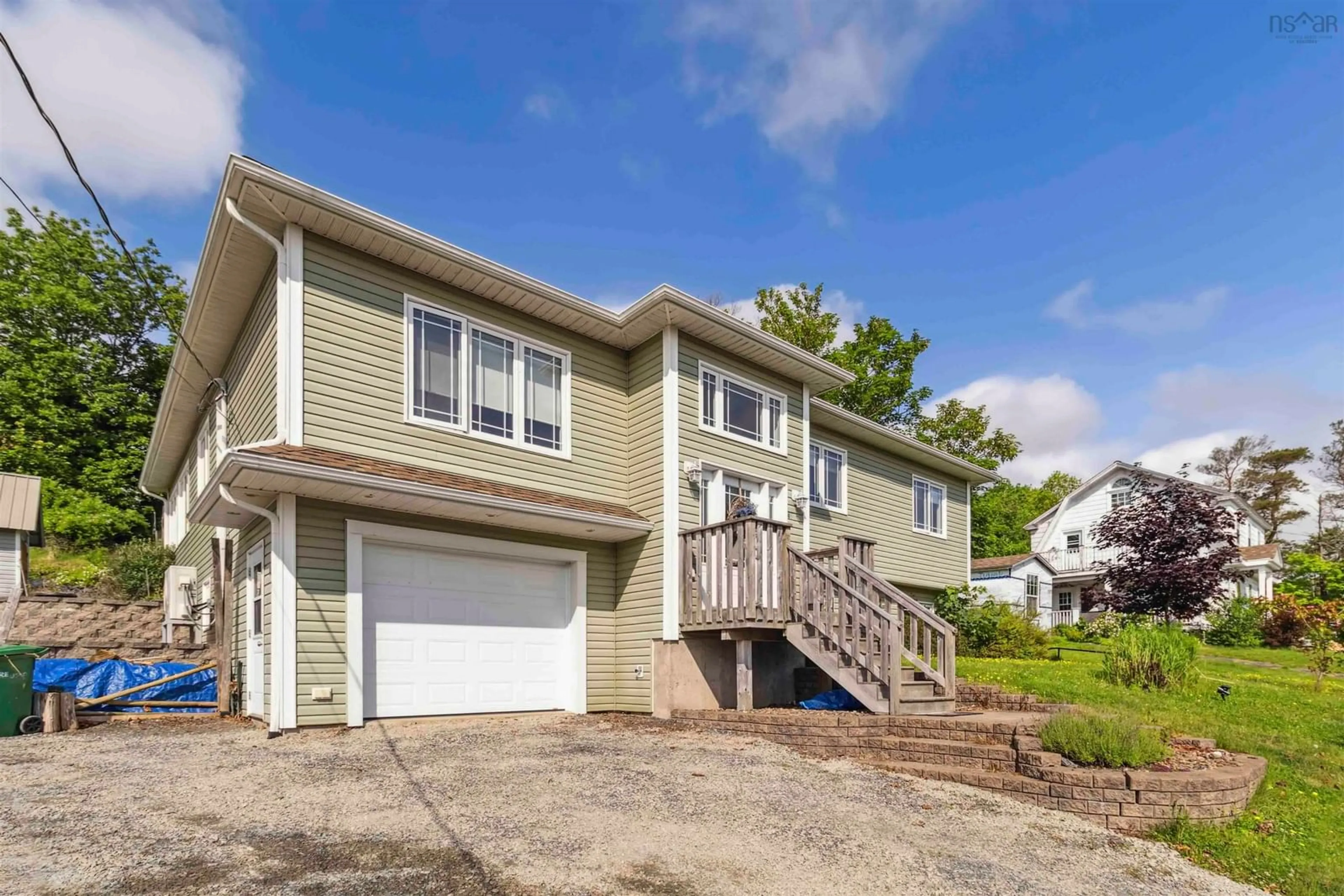 Home with vinyl exterior material, street for 61 Maple Ave, Lunenburg Nova Scotia B0J 2C0