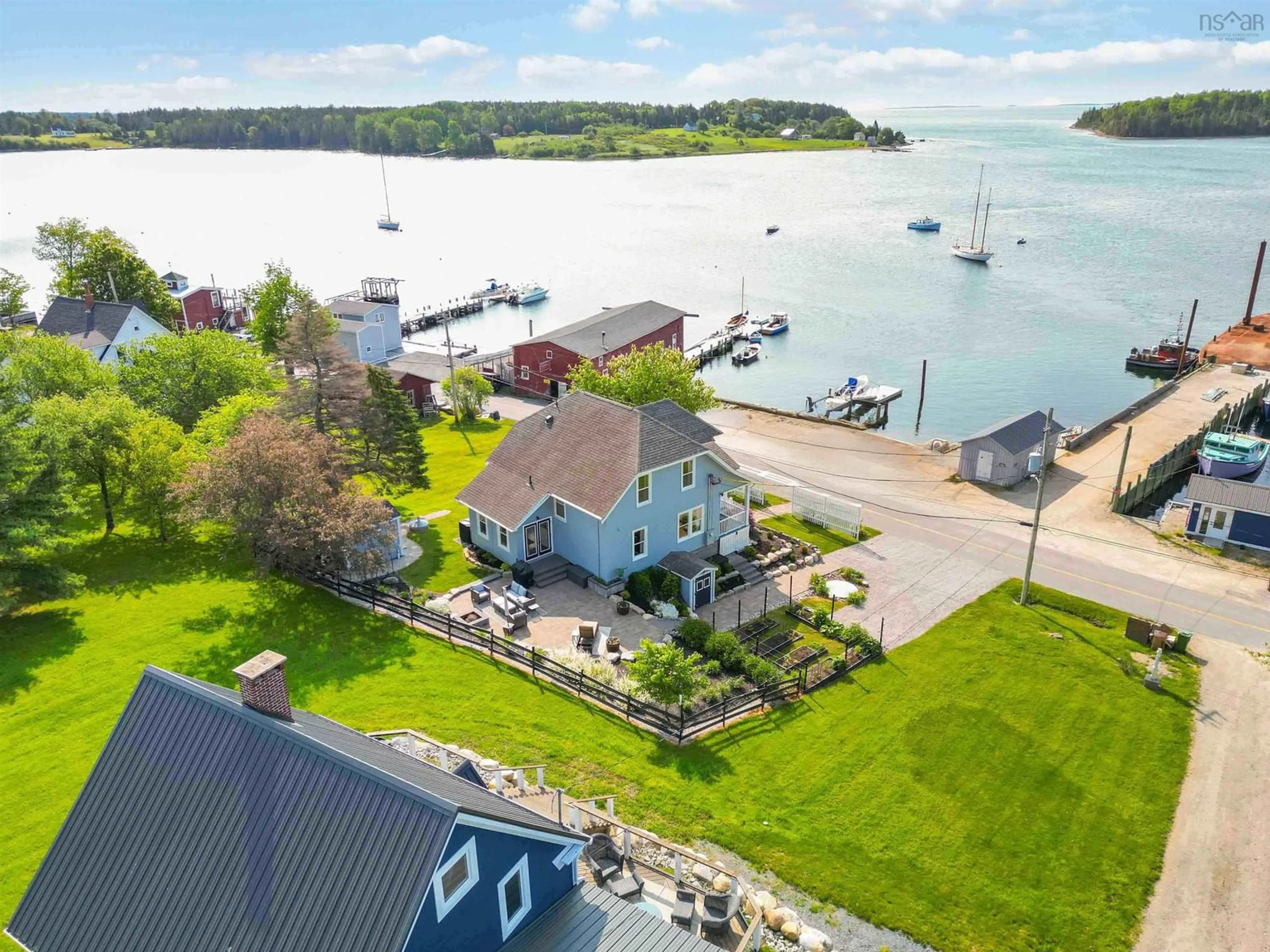 A pic from outside/outdoor area/front of a property/back of a property/a pic from drone, water/lake/river/ocean view for 287 Indian Point Rd, Mahone Bay Nova Scotia B0J 2E0
