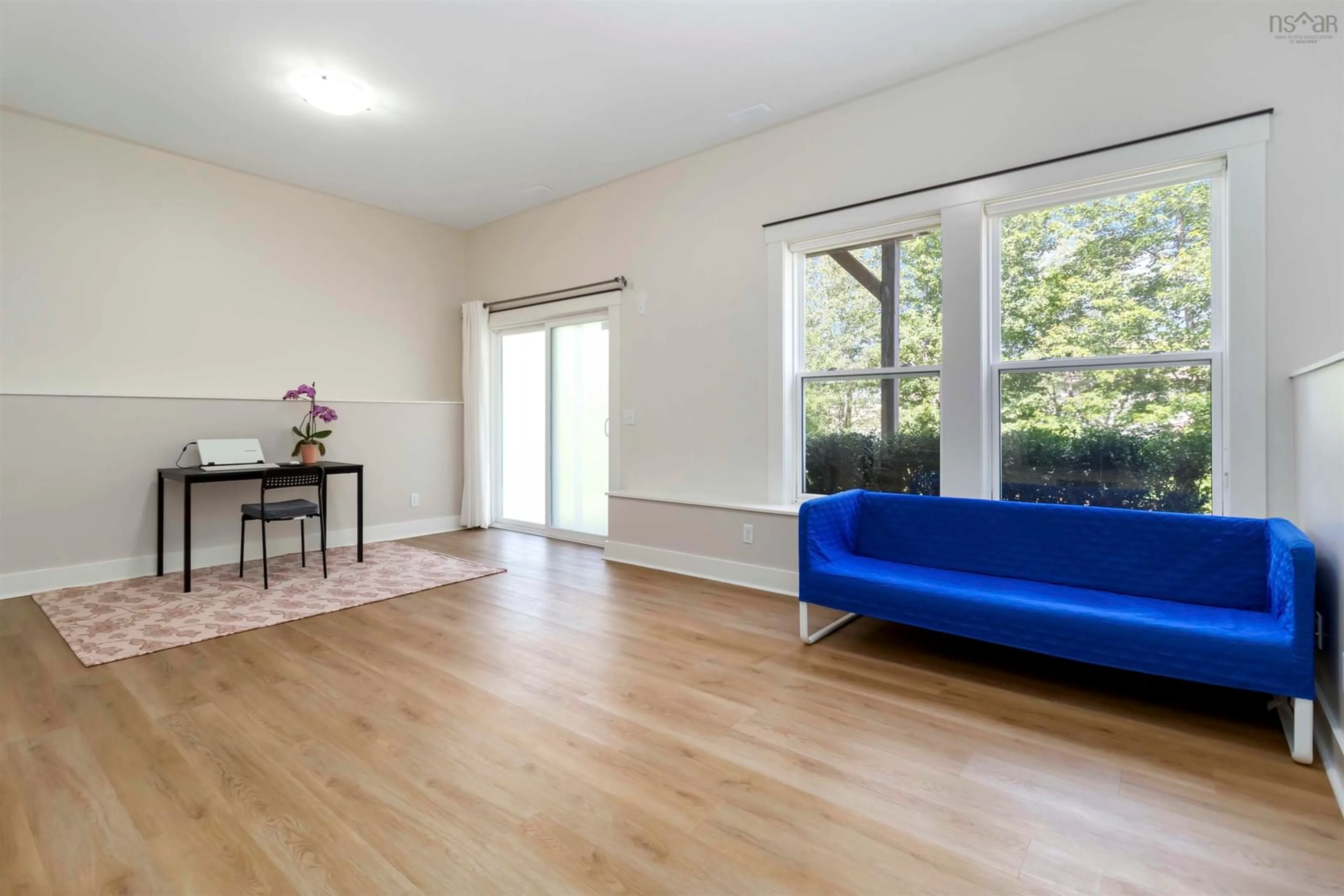 Living room with furniture, wood/laminate floor for 130 Capstone Cres, Bedford Nova Scotia B4B 0H5