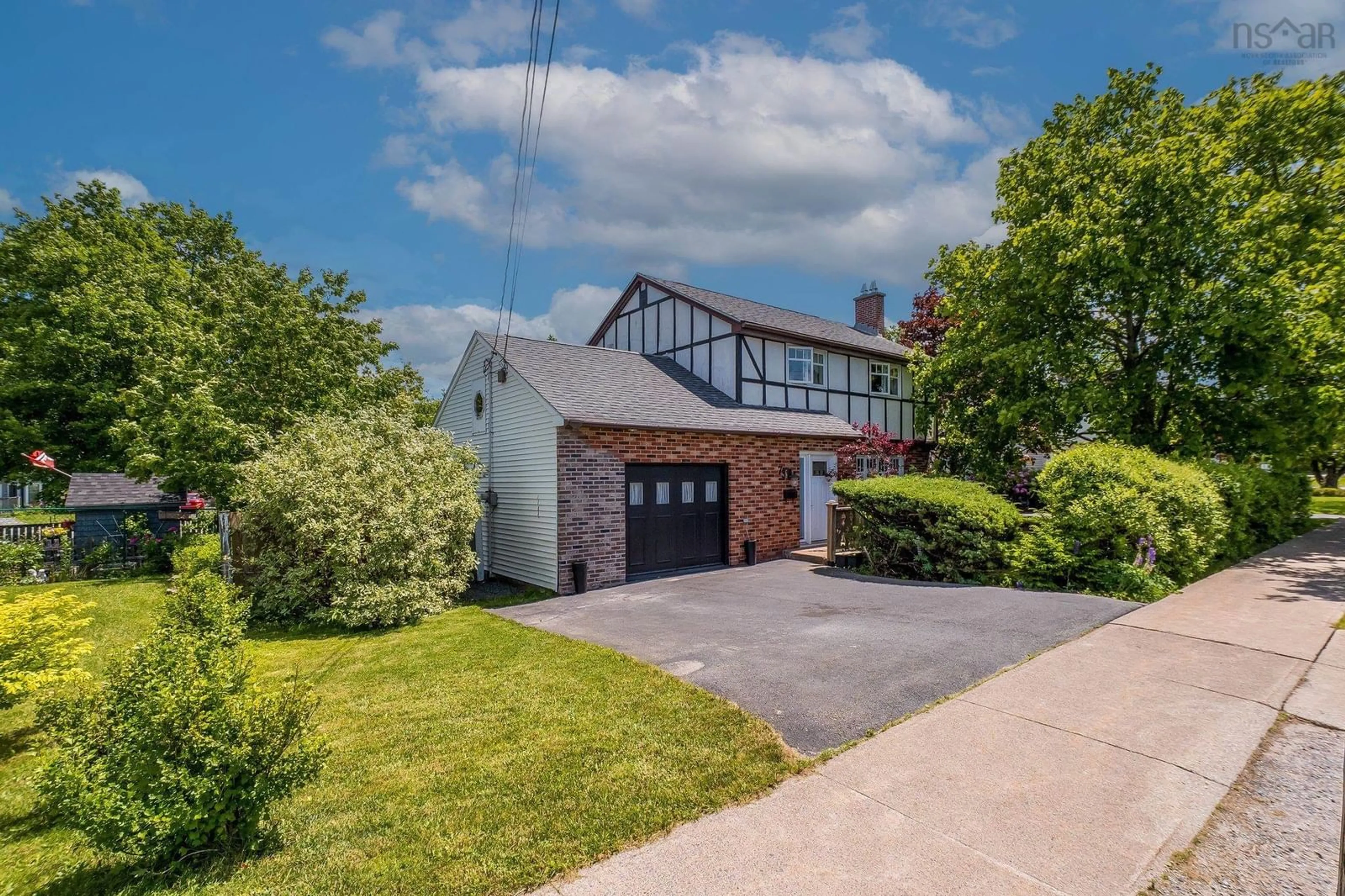 Home with brick exterior material, street for 73 Valleyfield Road, Dartmouth Nova Scotia B2W 1N8