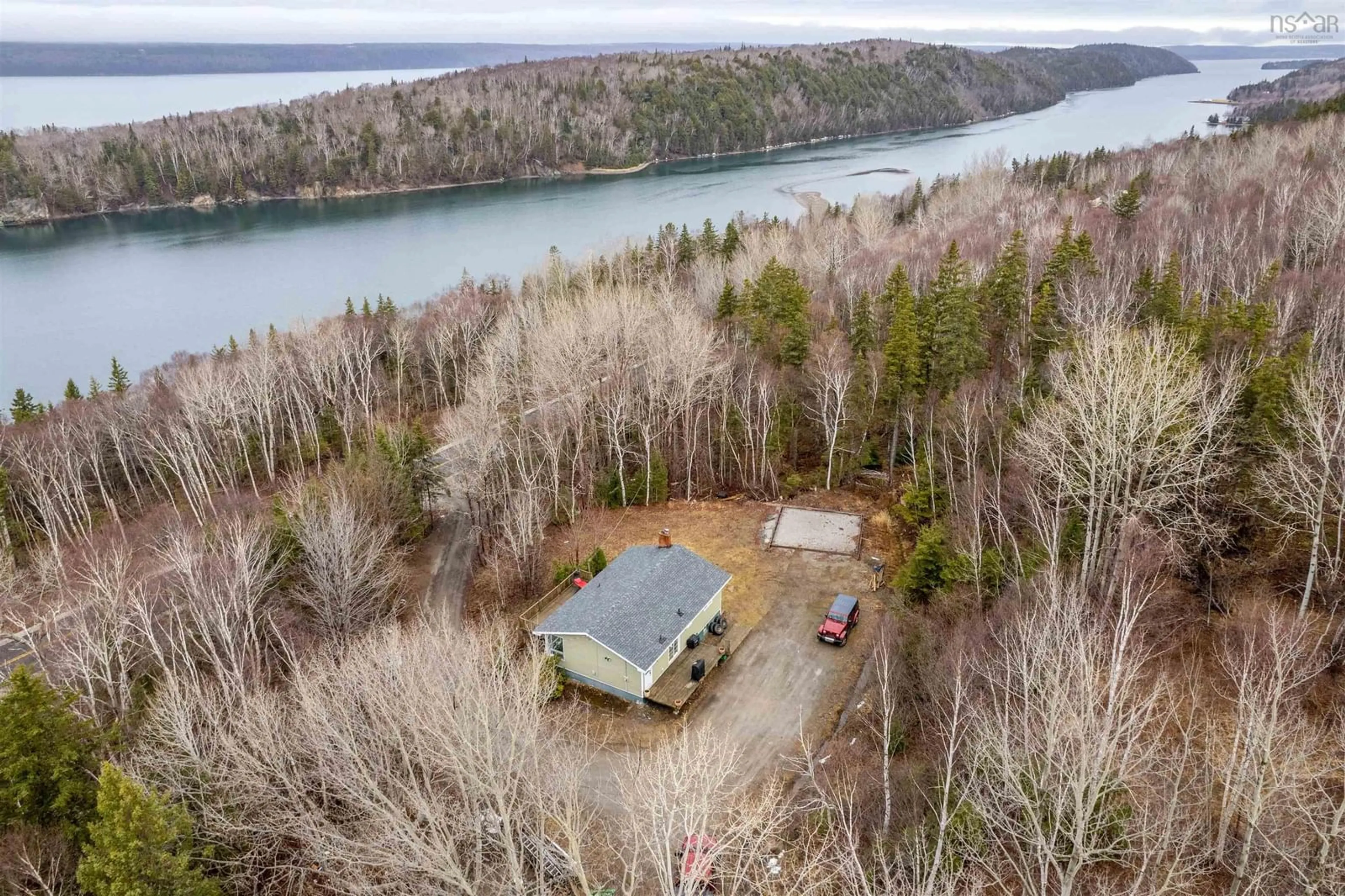 A pic from outside/outdoor area/front of a property/back of a property/a pic from drone, water/lake/river/ocean view for 3381 Long Island Rd, Long Island Nova Scotia B1Y 3N1