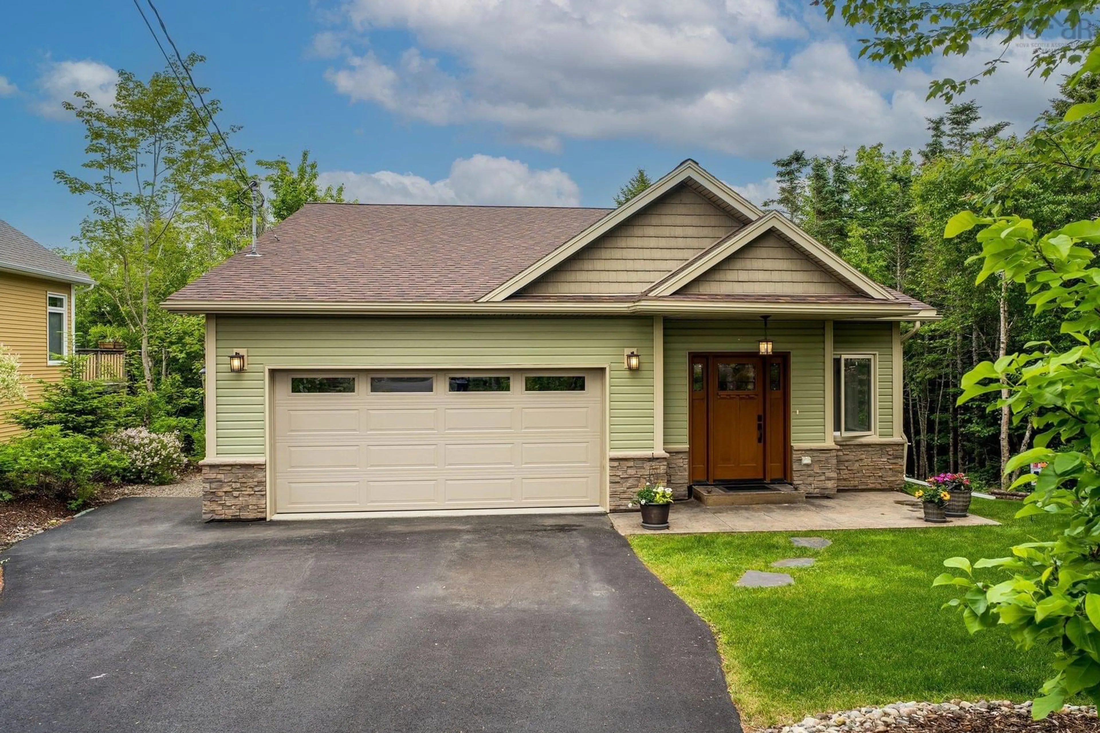 Home with vinyl exterior material, street for 57 Gosling Cir, Porters Lake Nova Scotia B3E 0C5