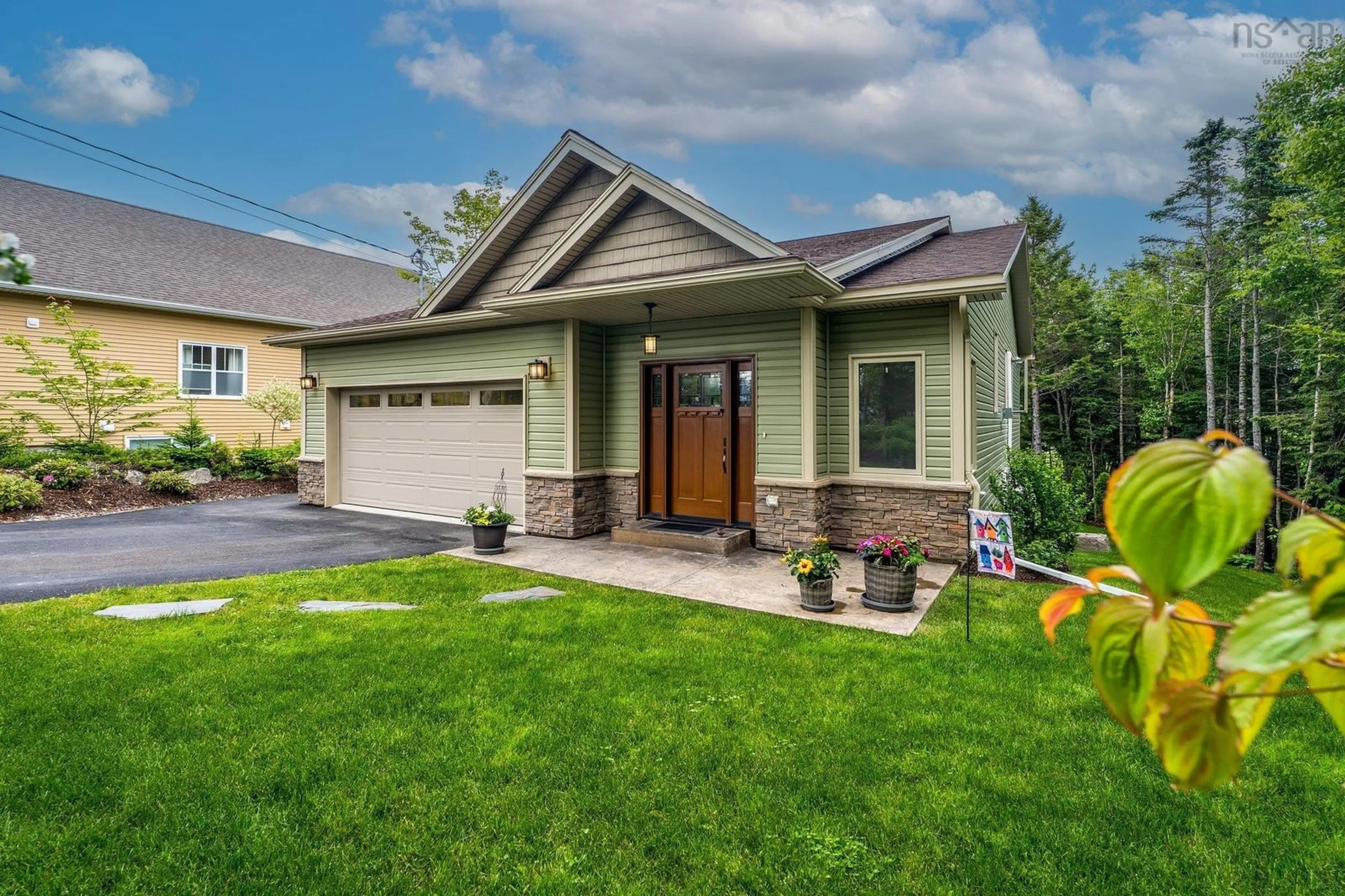 Home with vinyl exterior material, street for 57 Gosling Cir, Porters Lake Nova Scotia B3E 0C5
