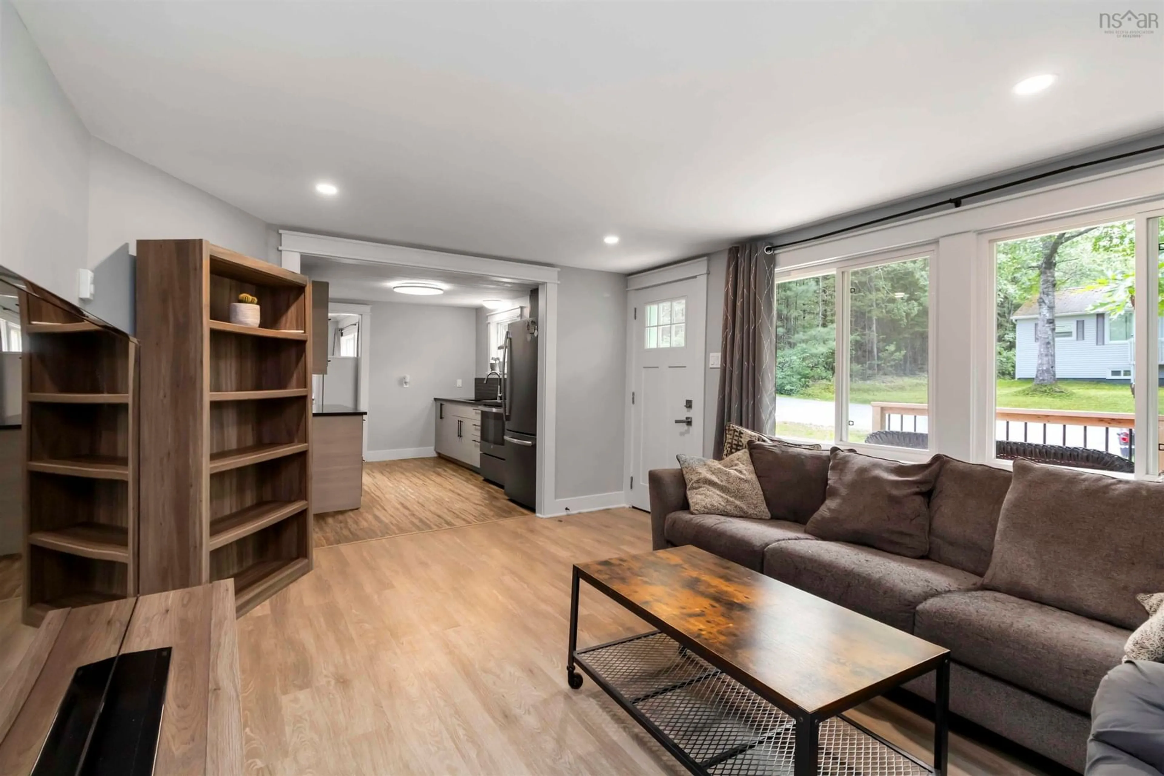 Living room with furniture, wood/laminate floor for 636 Kinsac Rd, Kinsac Nova Scotia B4G 1C8