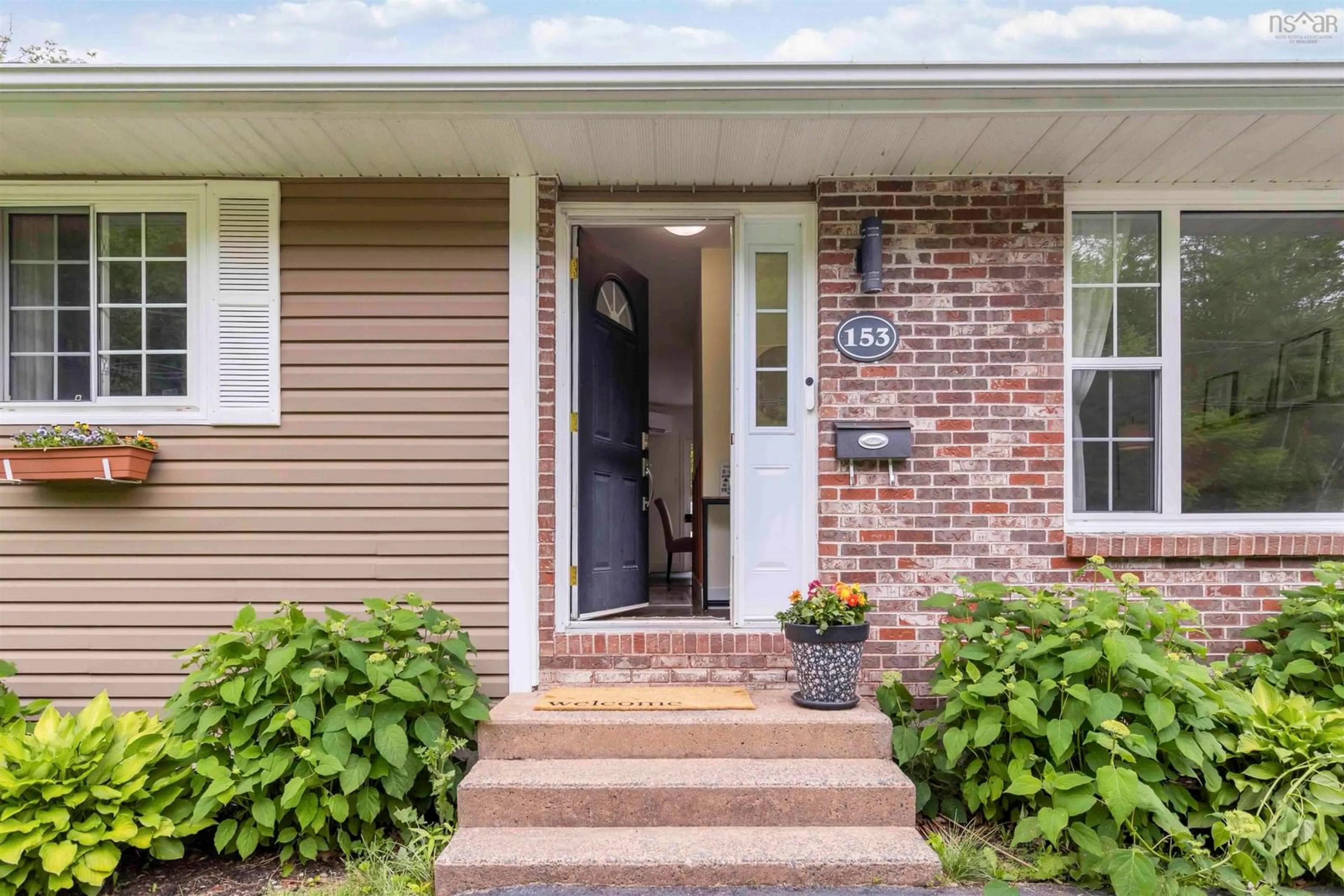Home with brick exterior material, street for 153 Cavalier Dr, Lower Sackville Nova Scotia B4C 3L1
