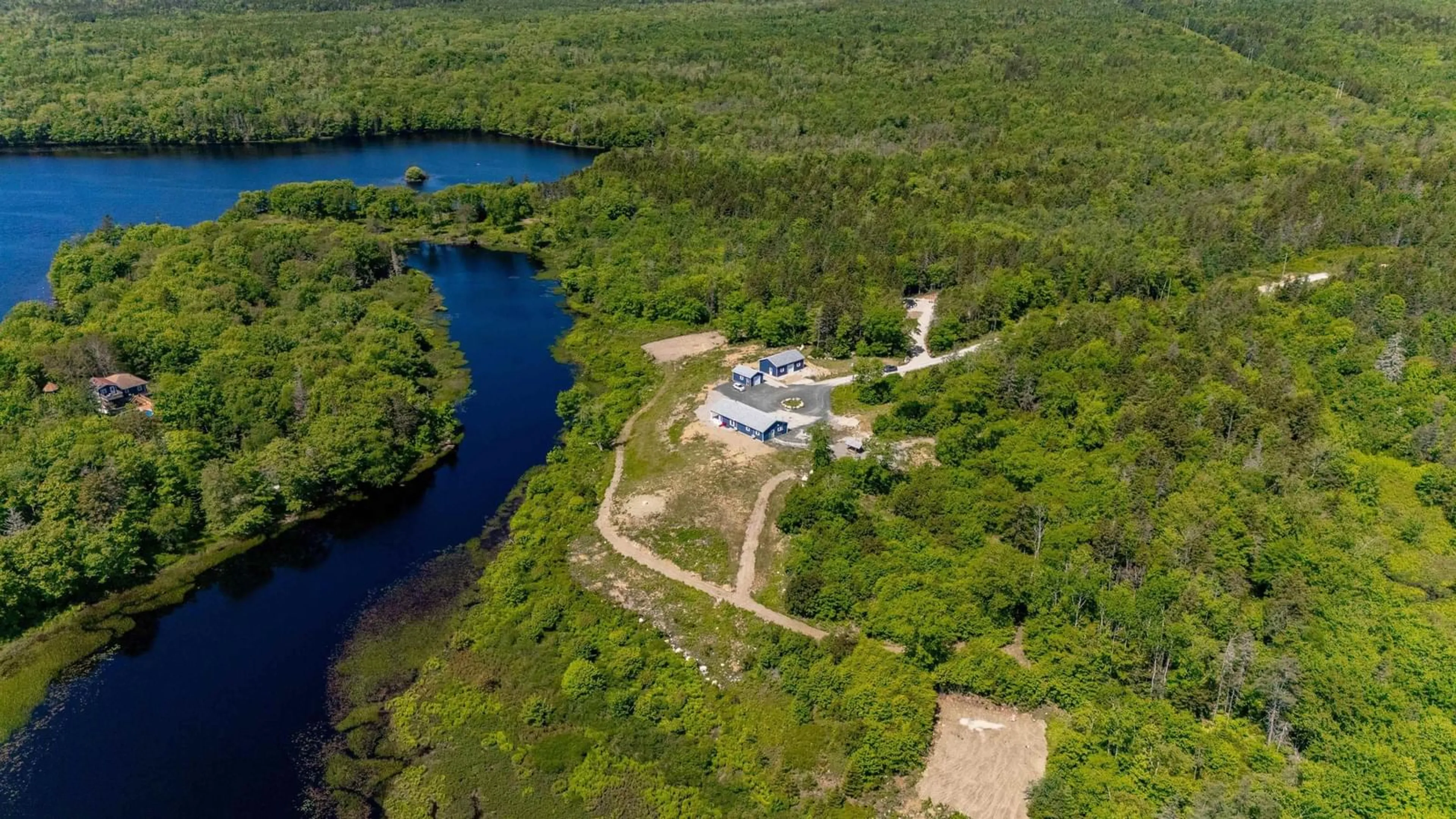 A pic from outside/outdoor area/front of a property/back of a property/a pic from drone, water/lake/river/ocean view for 54 Scott's Drive, Summerville Nova Scotia B5A 5J5