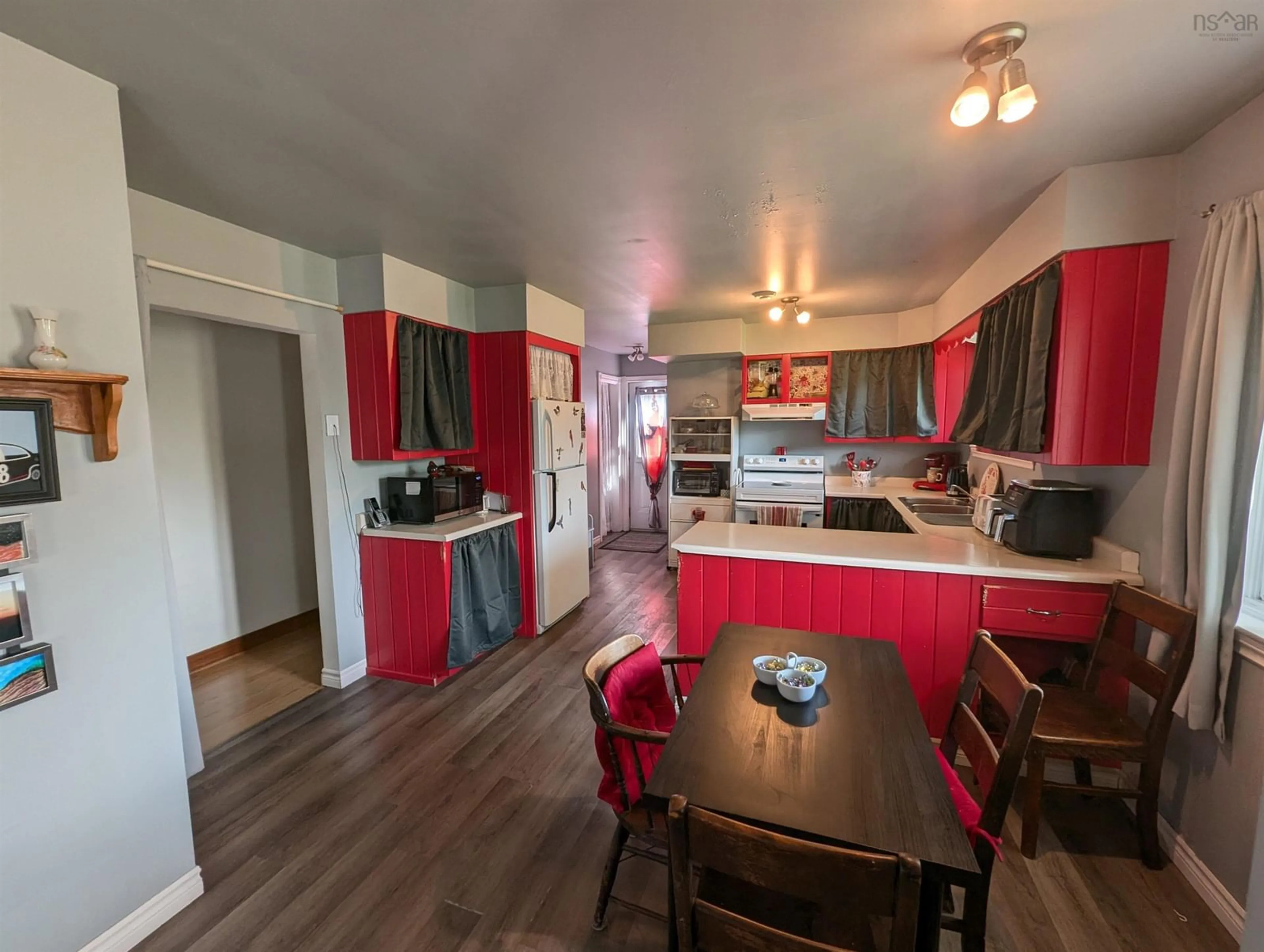 Open concept kitchen, wood/laminate floor for 1335 Highway 2, Lantz Nova Scotia B2S 1Z2
