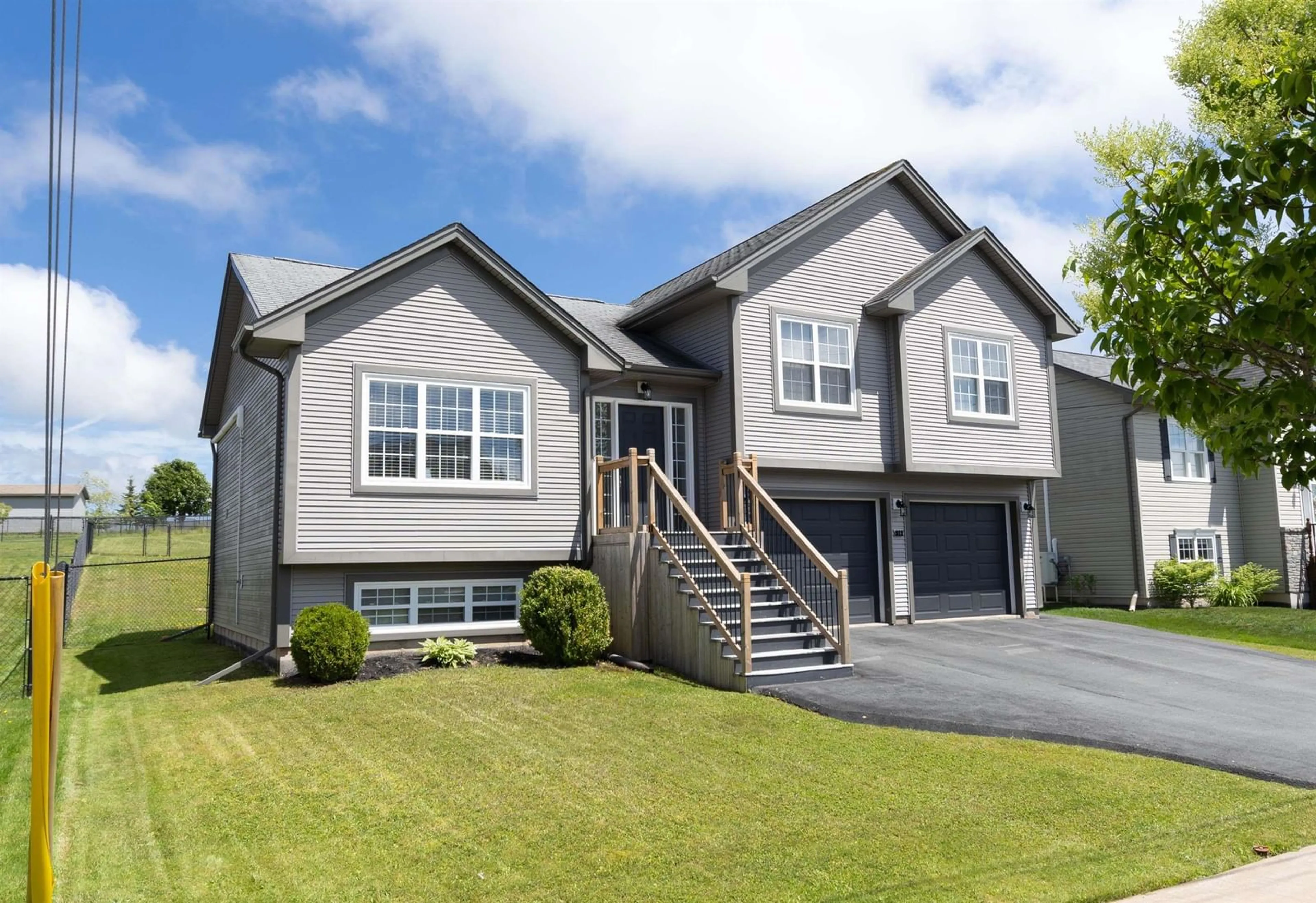 Home with vinyl exterior material, street for 14 Iron Crt, Sackville Nova Scotia B4E 0B9