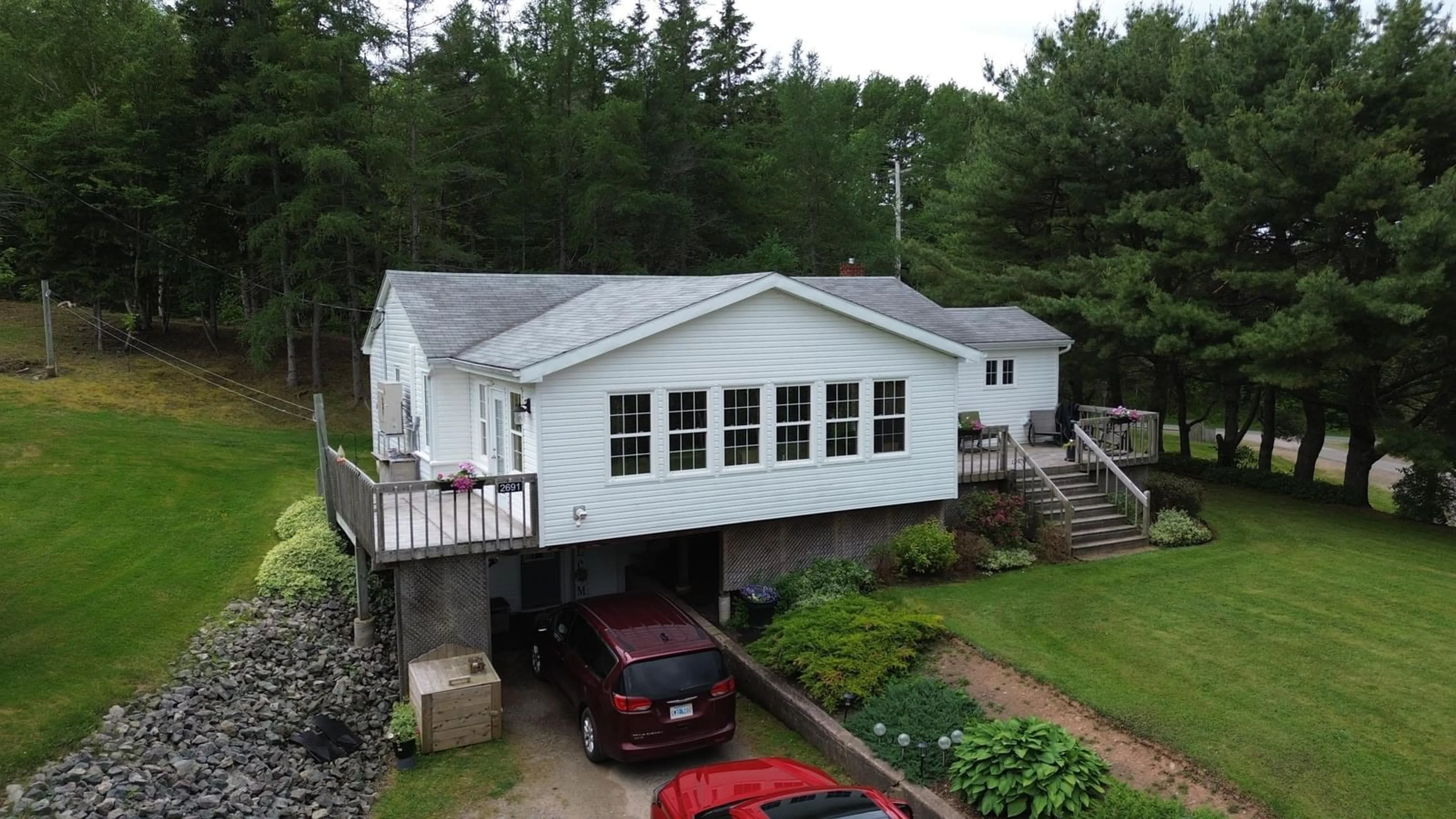 A pic from outside/outdoor area/front of a property/back of a property/a pic from drone, unknown for 2691 East Margaree Rd, Margaree Forks Nova Scotia B0E 2A0