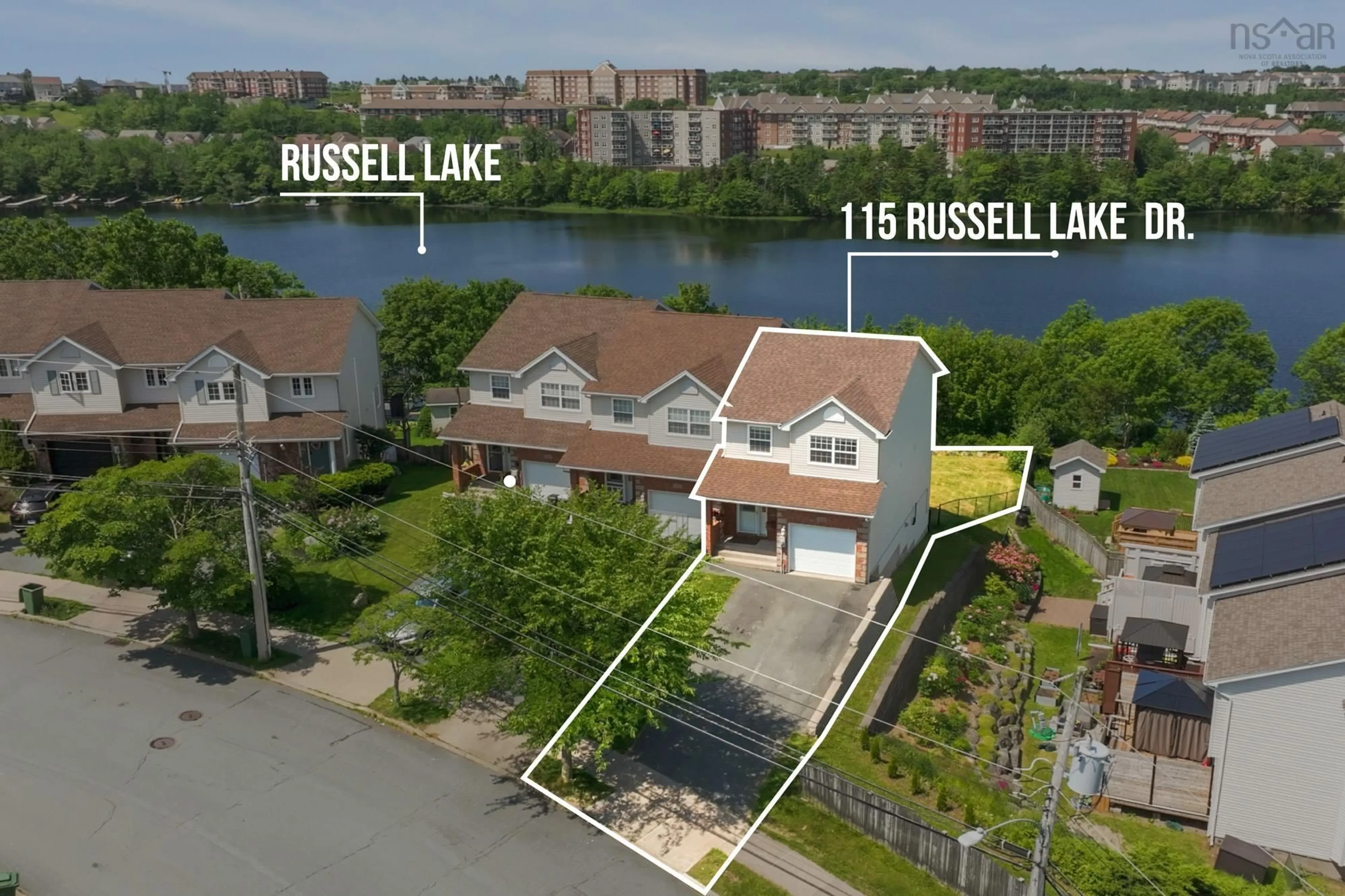 A pic from outside/outdoor area/front of a property/back of a property/a pic from drone, water/lake/river/ocean view for 115 Russell Lake Dr, Dartmouth Nova Scotia B2W 6J5