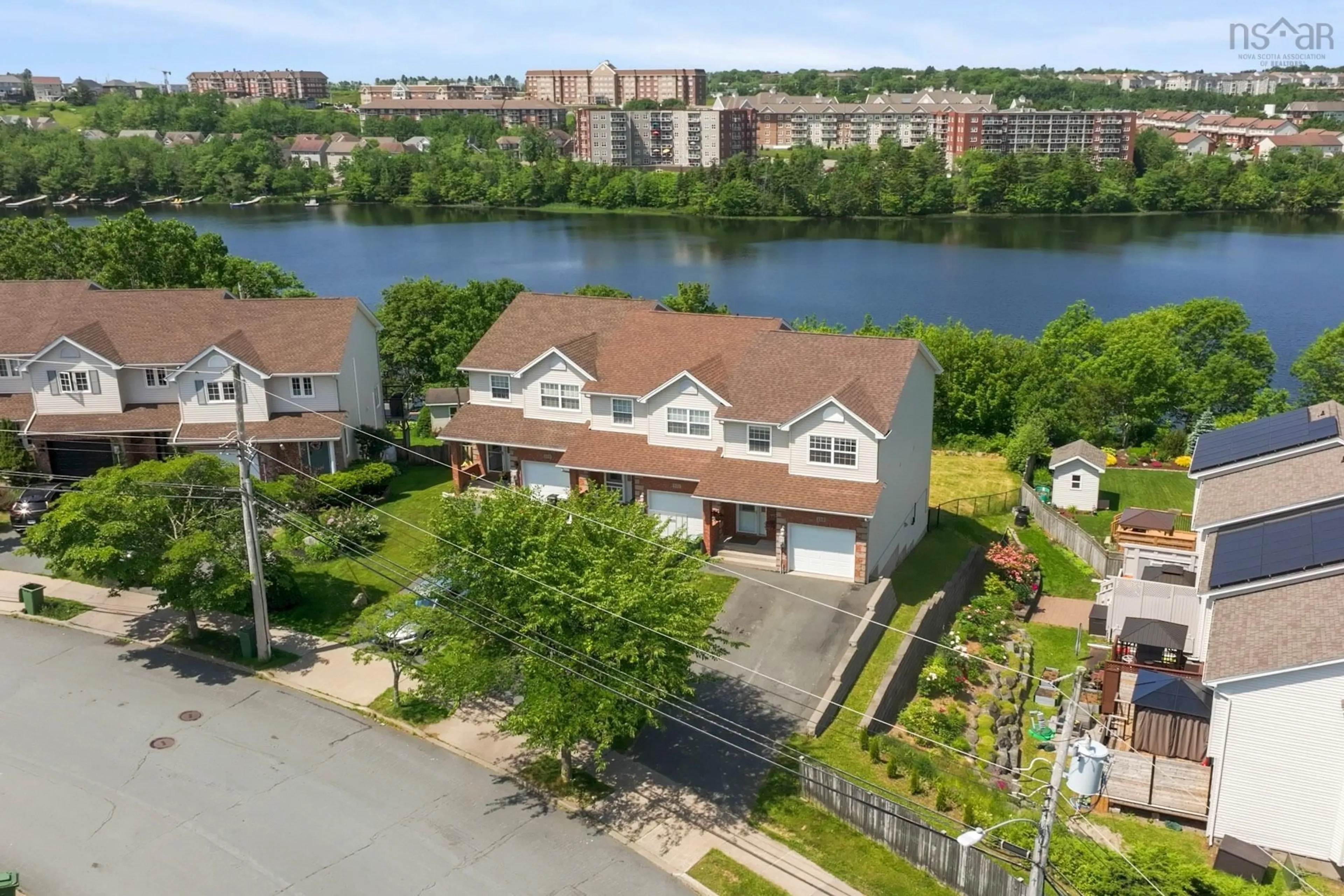 A pic from outside/outdoor area/front of a property/back of a property/a pic from drone, water/lake/river/ocean view for 115 Russell Lake Dr, Dartmouth Nova Scotia B2W 6J5