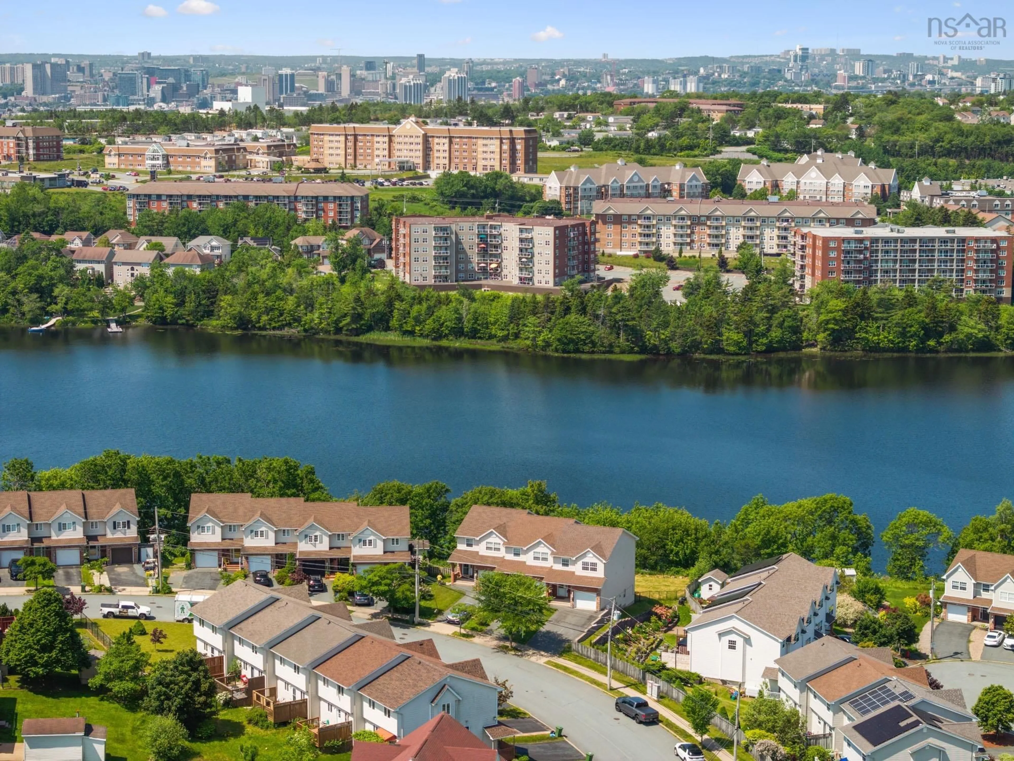 A pic from outside/outdoor area/front of a property/back of a property/a pic from drone, water/lake/river/ocean view for 115 Russell Lake Dr, Dartmouth Nova Scotia B2W 6J5