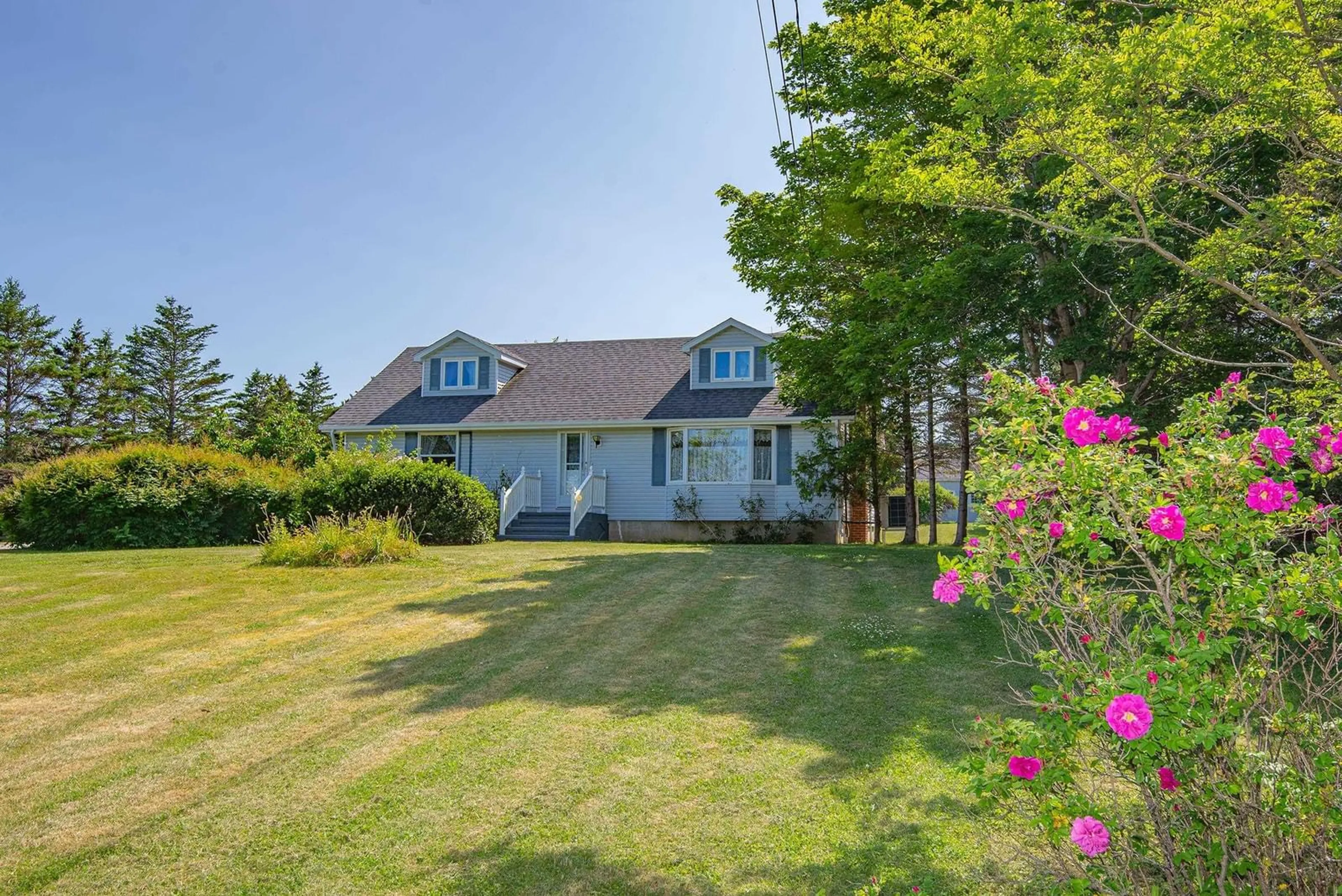 A pic from outside/outdoor area/front of a property/back of a property/a pic from drone, water/lake/river/ocean view for 194 Peter Dugas Rd, Meteghan Nova Scotia B0W 2J0