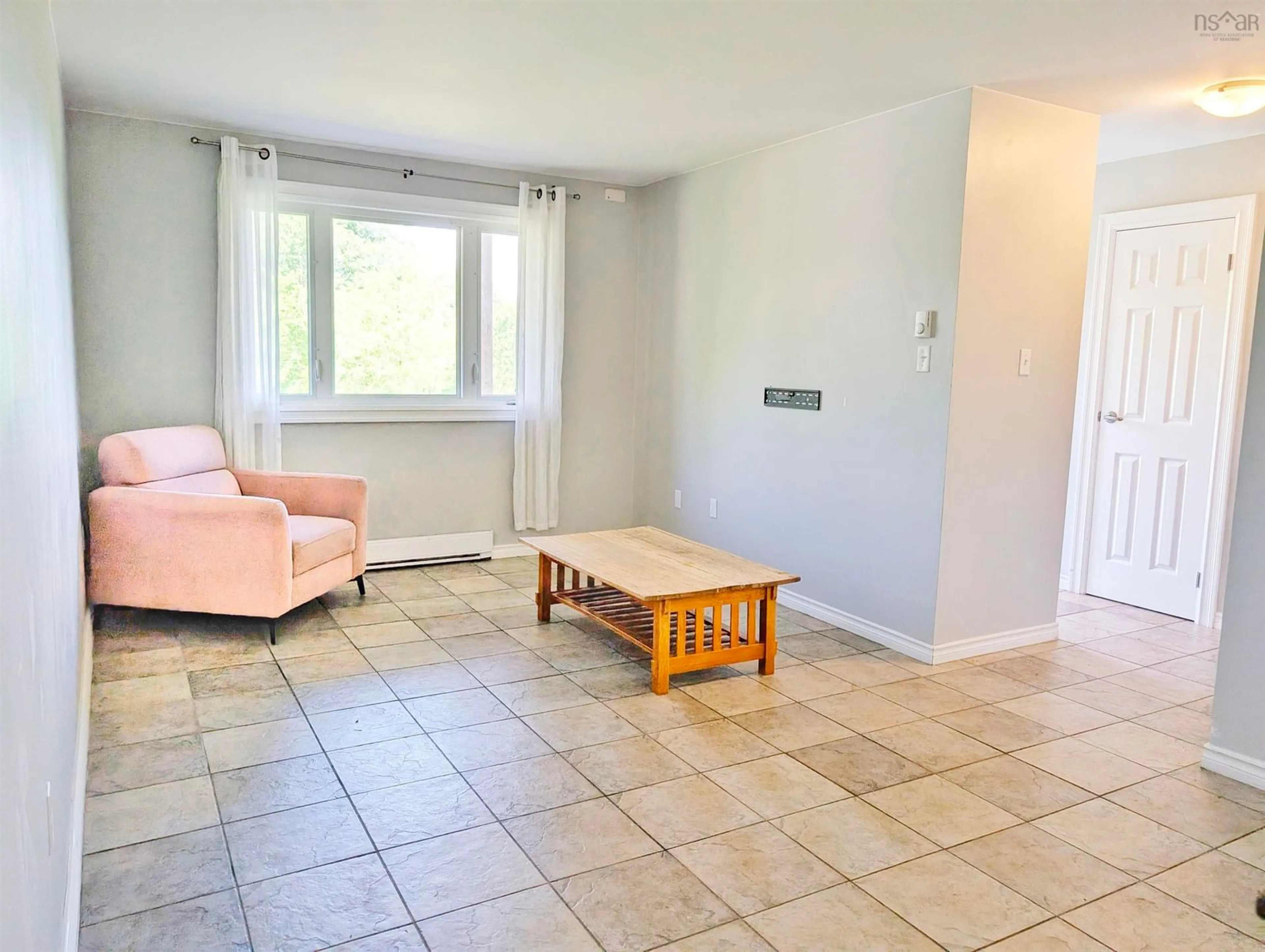 Living room with furniture, unknown for 8 Blomidon Terr #815, Wolfville Nova Scotia B4P 2G9
