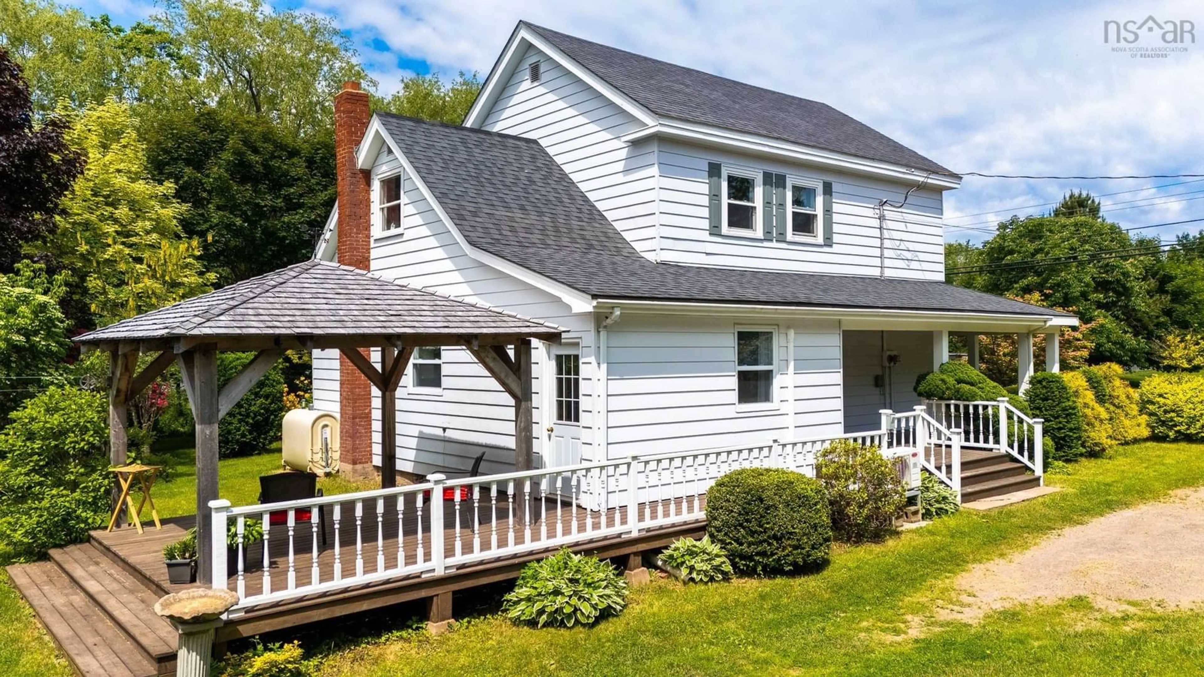 Home with vinyl exterior material, street for 10126 221 Hwy, Habitant Nova Scotia B0P 1H0