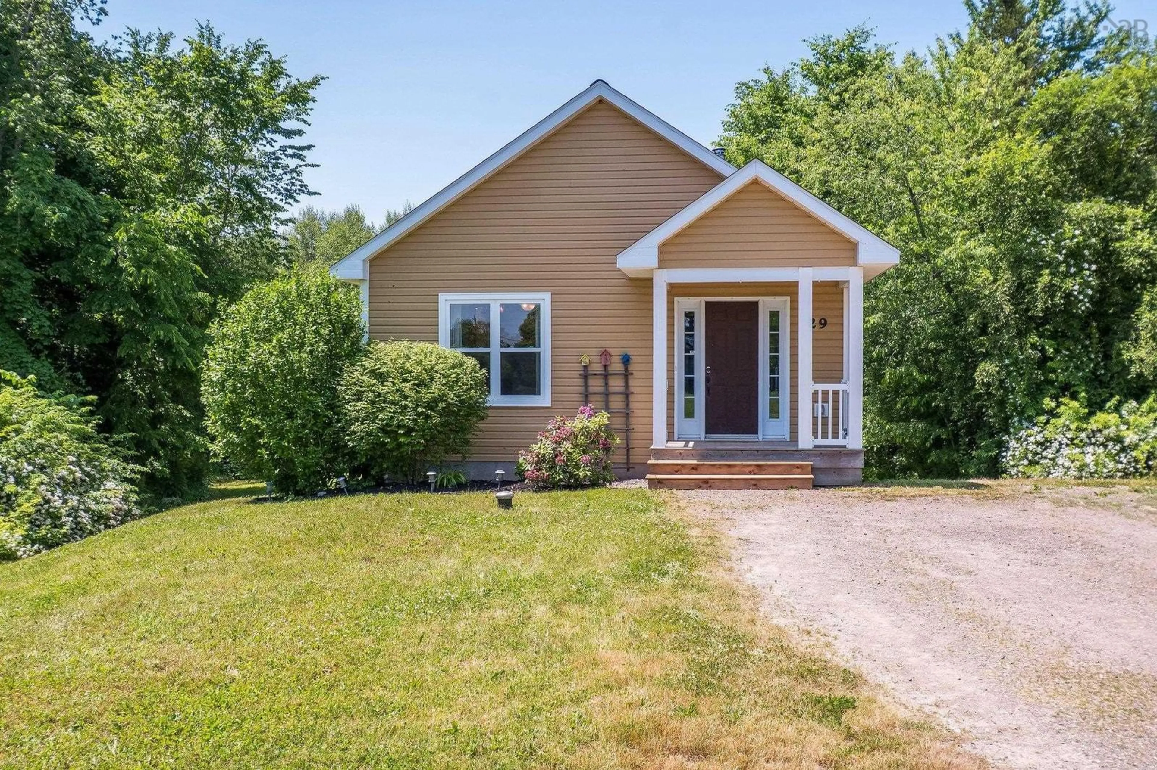 Home with vinyl exterior material, street for 29 Henshaw Dr, Upper Dyke Nova Scotia B0P 1J0