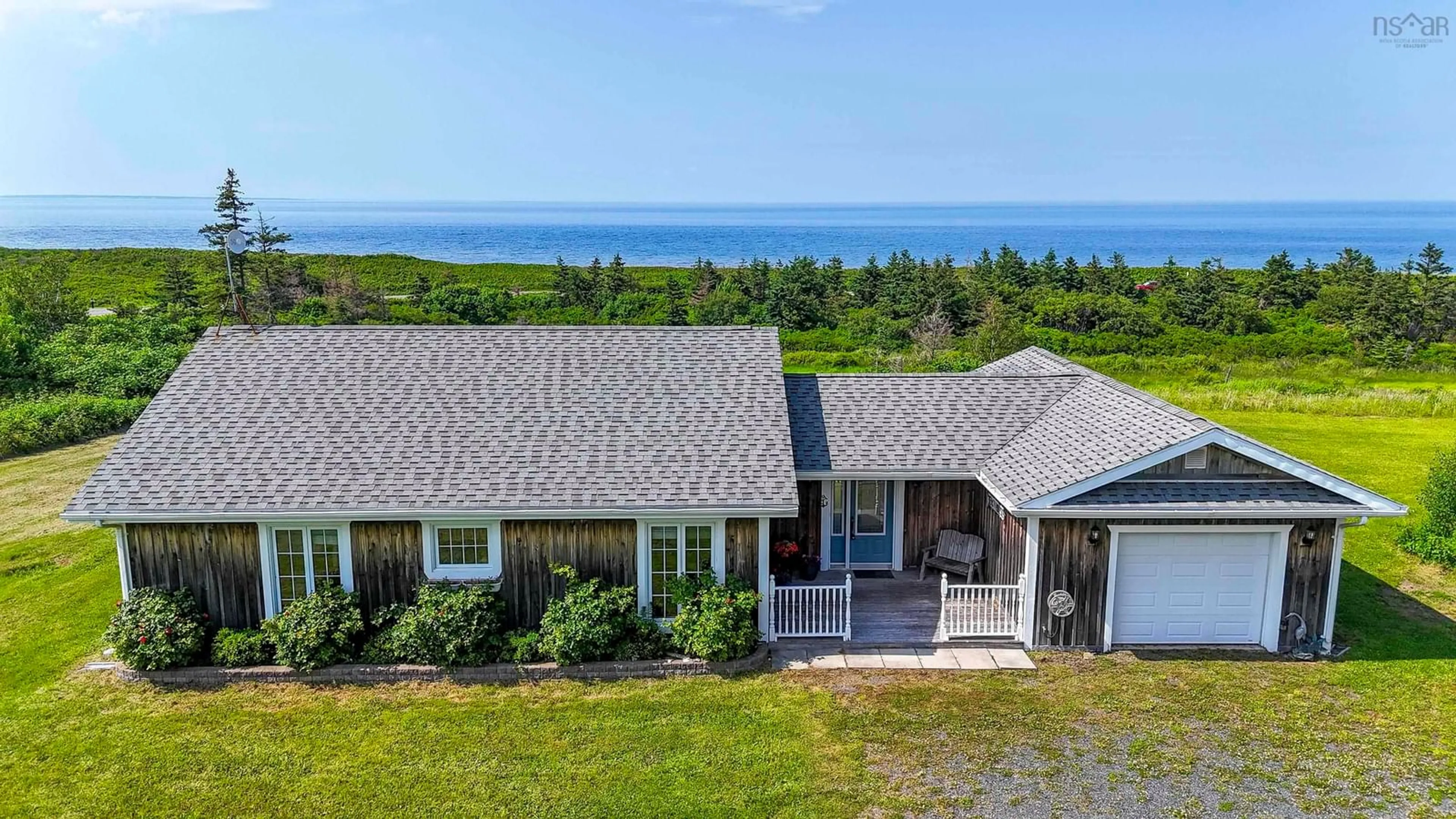 A pic from outside/outdoor area/front of a property/back of a property/a pic from drone, water/lake/river/ocean view for 12 Birch Water Dr, Big Island Nova Scotia B0K 1G0