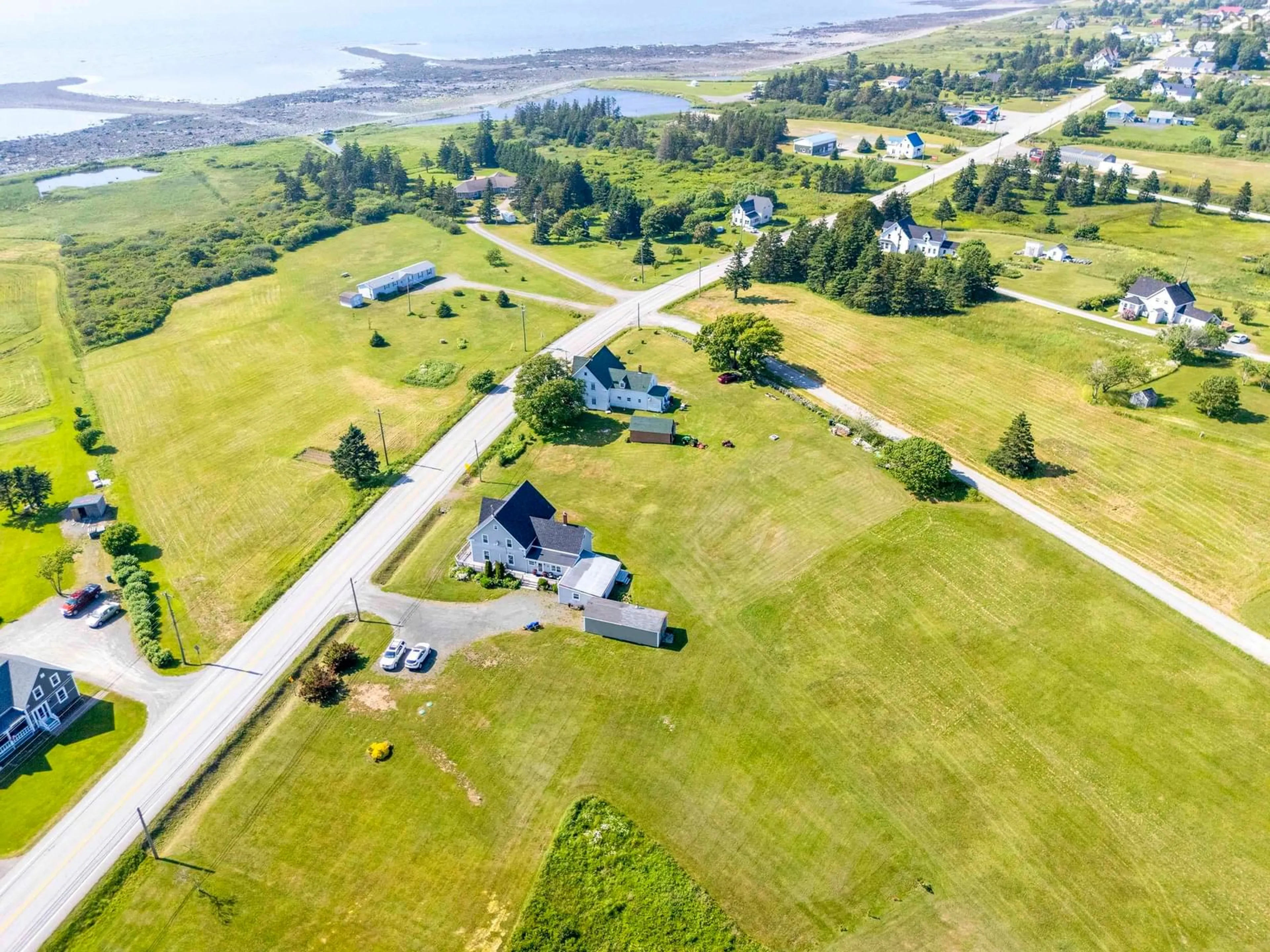 A pic from outside/outdoor area/front of a property/back of a property/a pic from drone, water/lake/river/ocean view for 9396 Highway 1, Lower Saulnierville Nova Scotia B0W 3T0