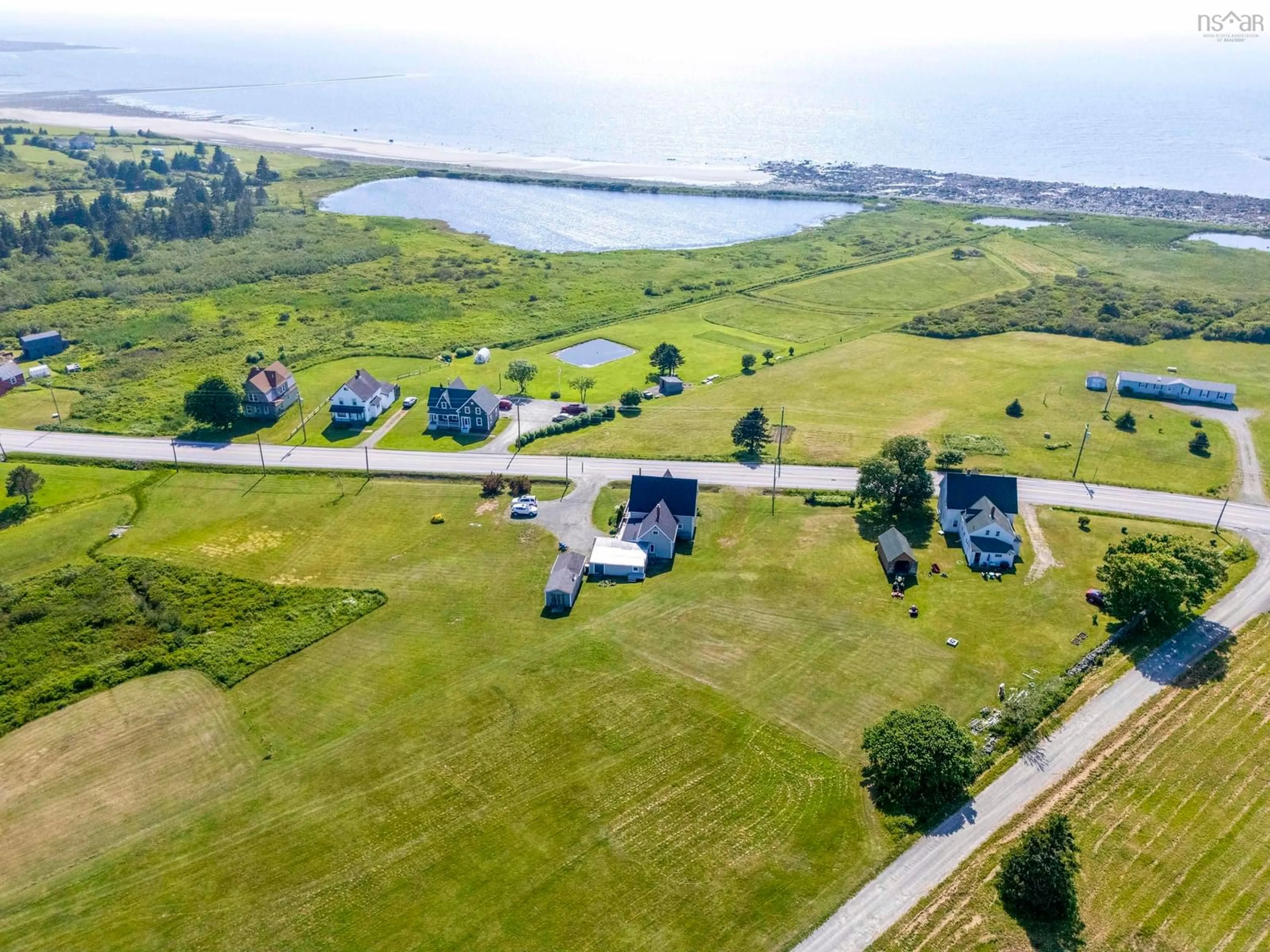 A pic from outside/outdoor area/front of a property/back of a property/a pic from drone, water/lake/river/ocean view for 9396 Highway 1, Lower Saulnierville Nova Scotia B0W 3T0