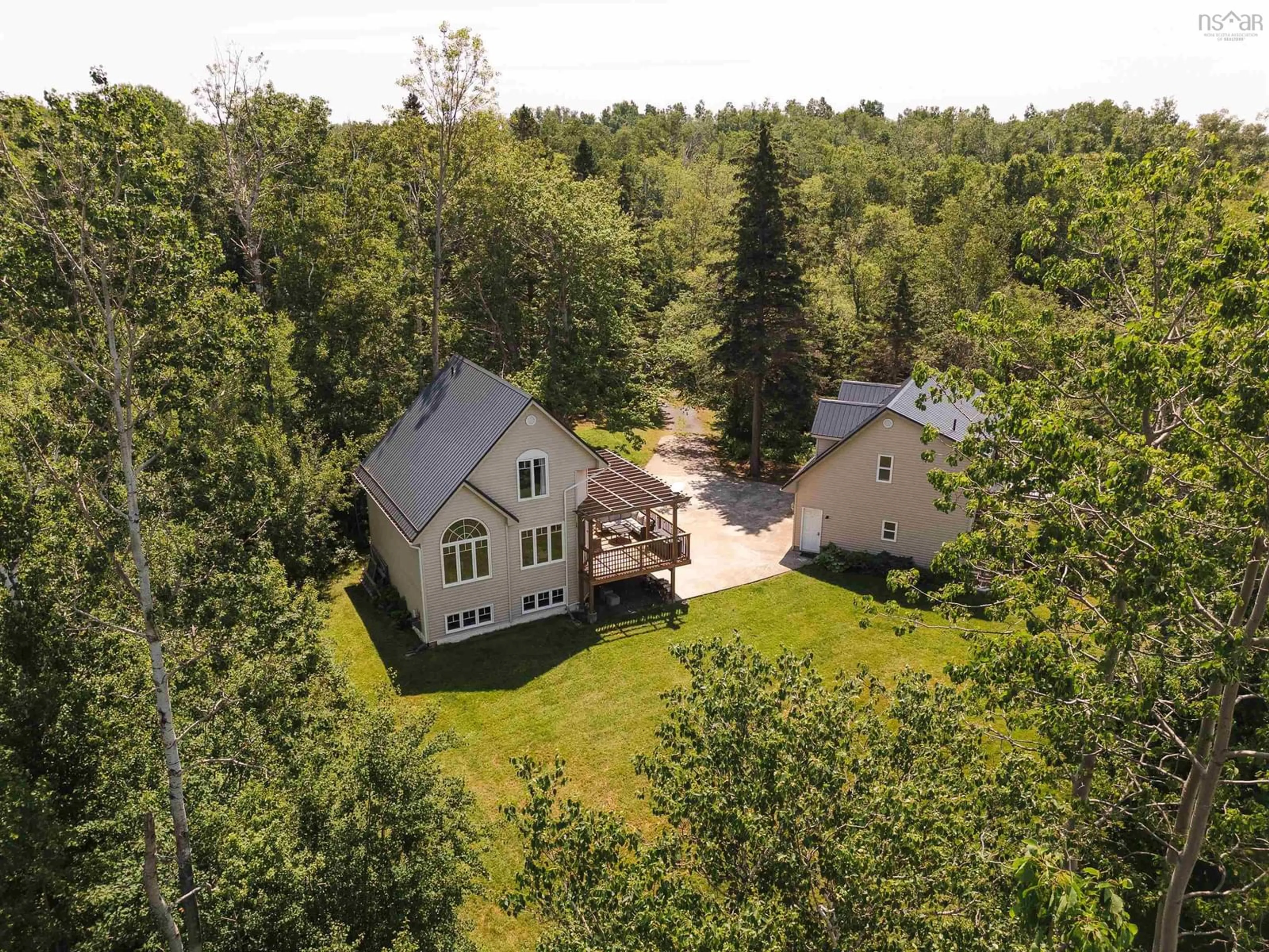 A pic from outside/outdoor area/front of a property/back of a property/a pic from drone, forest/trees view for 19 Tidal Dr, Kempt Shore Nova Scotia B0N 2A0