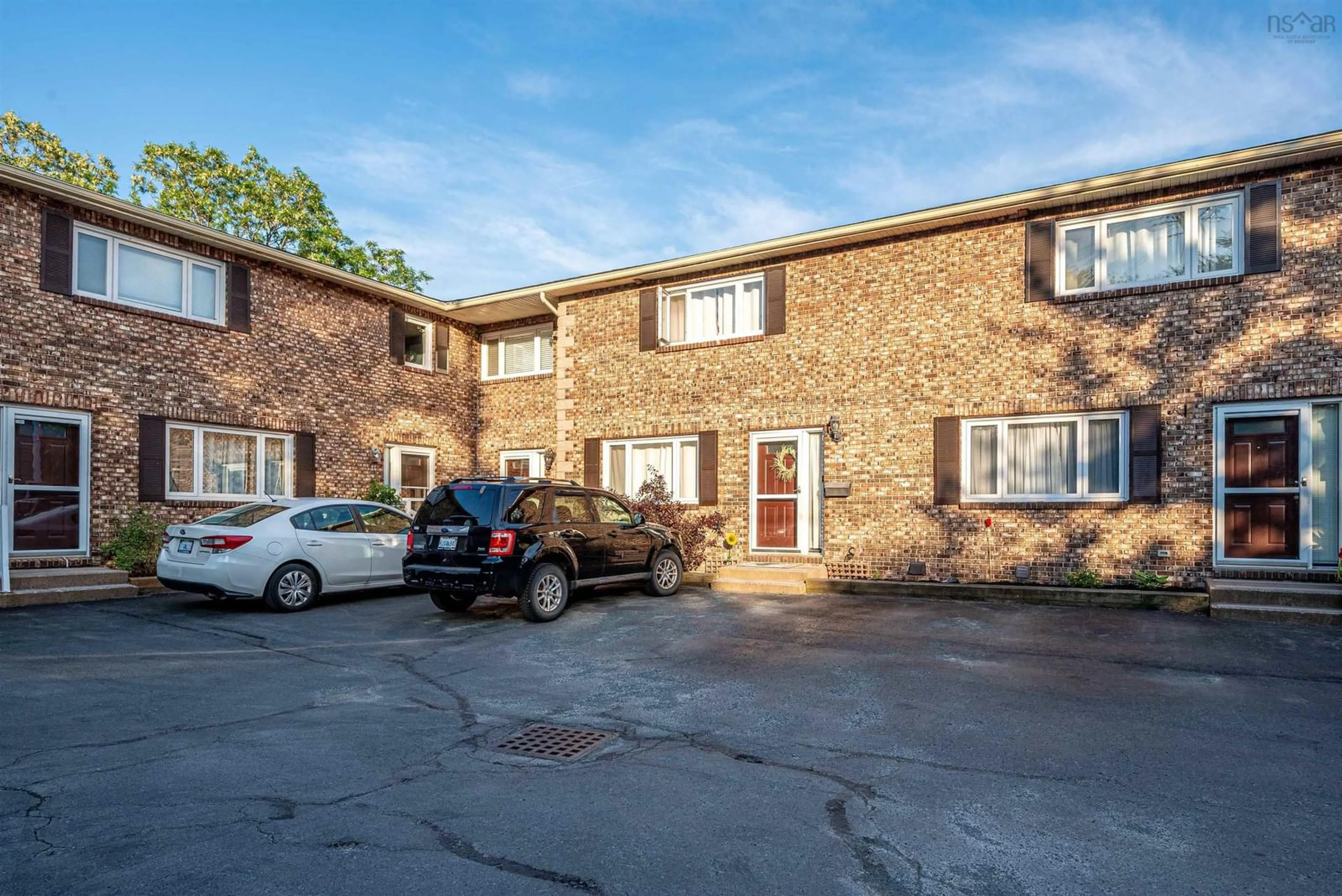 A pic from outside/outdoor area/front of a property/back of a property/a pic from drone, unknown for 18 Pioneer Ave #2, Halifax Nova Scotia B3M 1V2