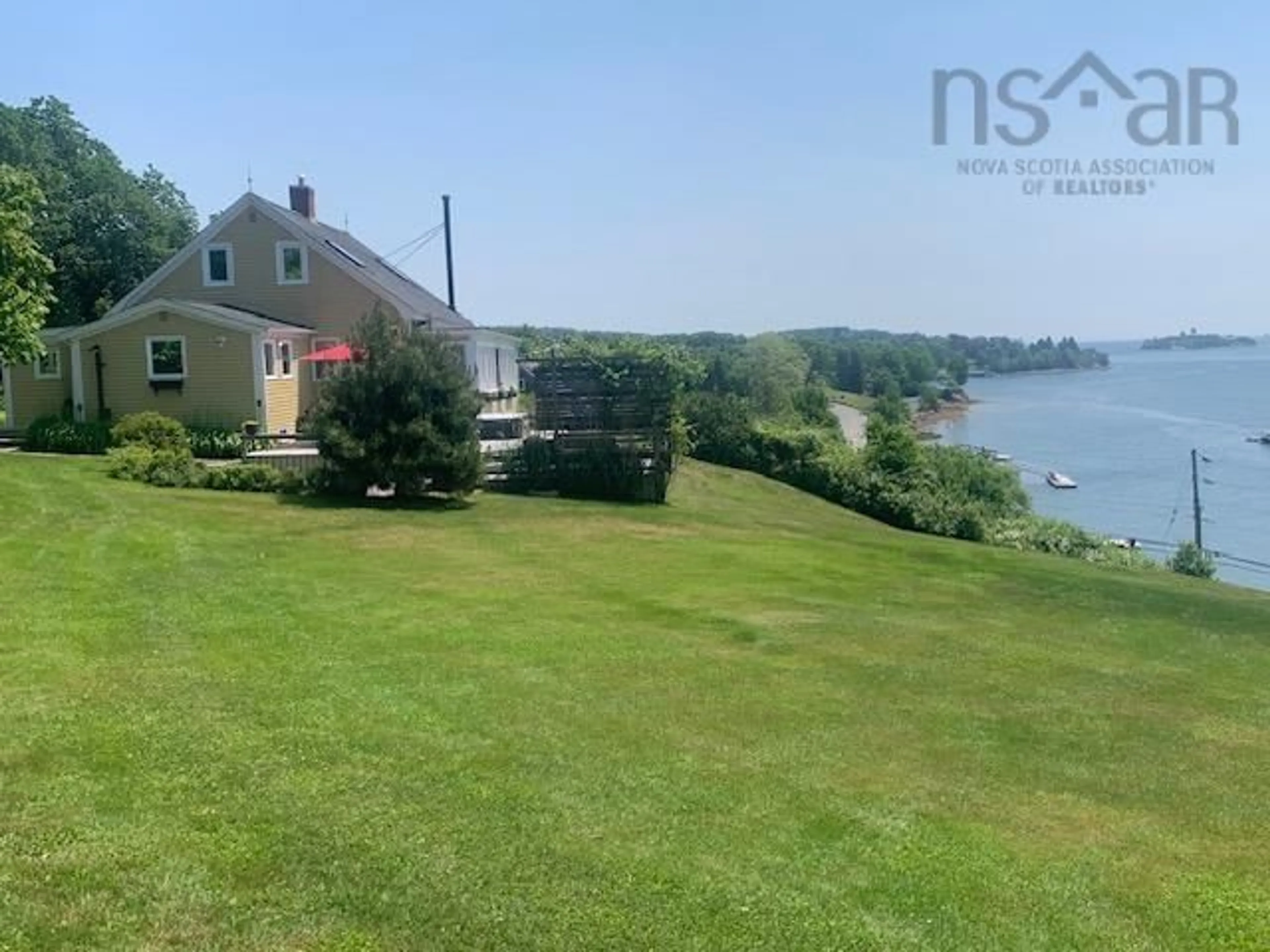 A pic from outside/outdoor area/front of a property/back of a property/a pic from drone, water/lake/river/ocean view for 90 Eisenhauer Rd, Oakland Nova Scotia B0J 2E0